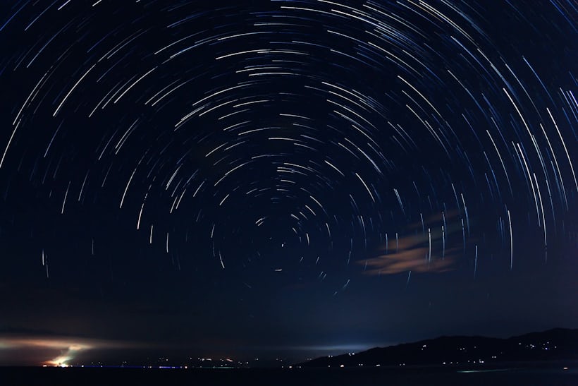 Time lapse image of the night sky showing the apparent motion of the stars