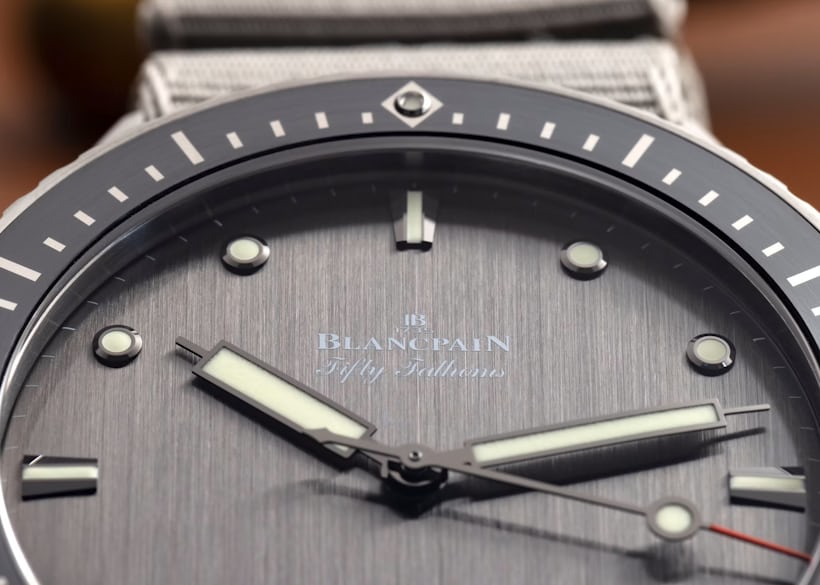 A close-up on the dial of the Blancpain Fifty Fathoms Bathyscaphe Titanium 43mm