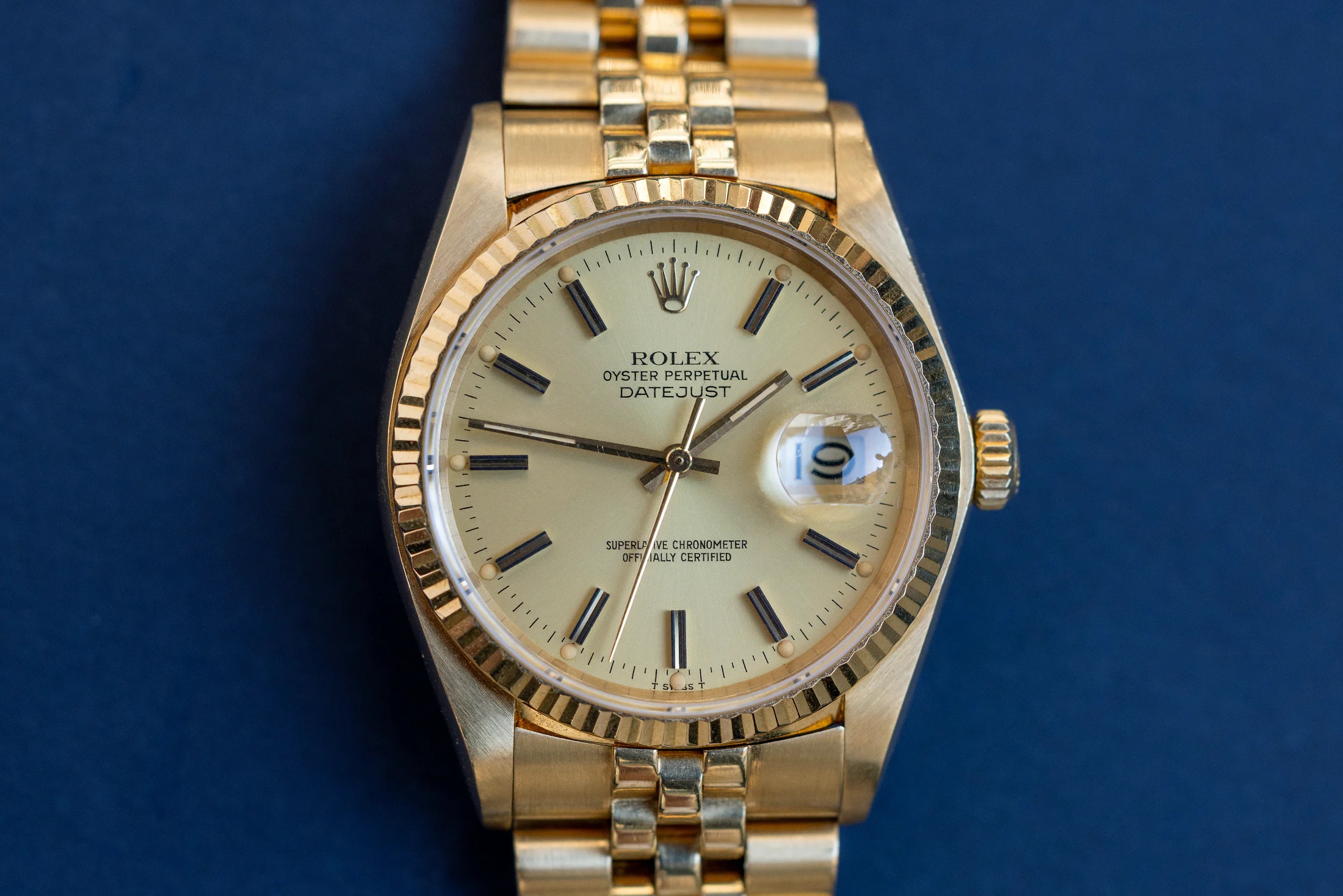 A gold Rolex datejust