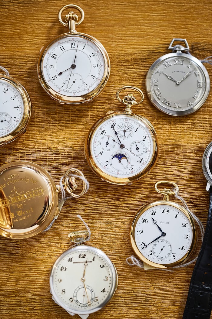 pocket watches on a table