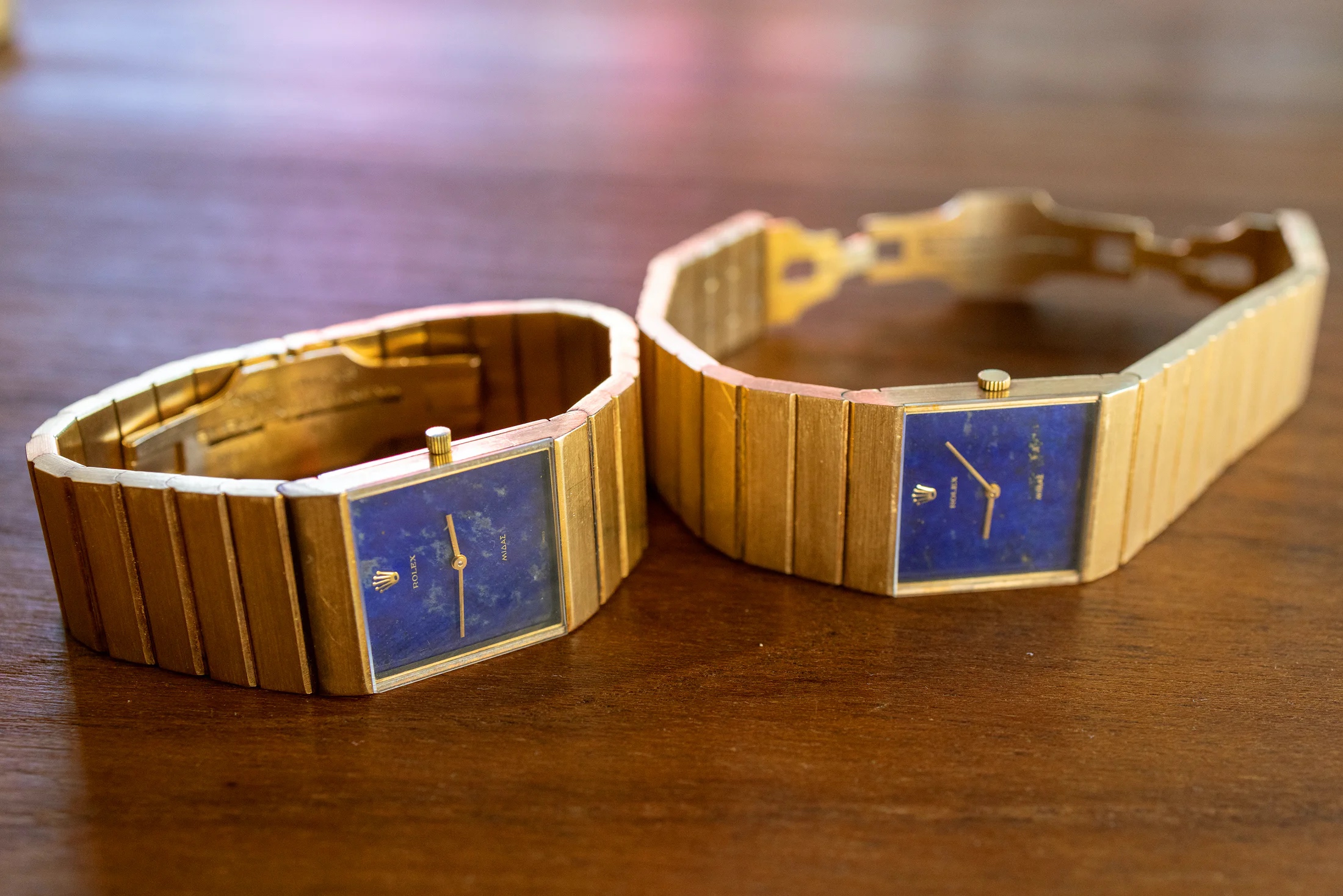 Two Rolex King Midas watches with different sized crowns side by side