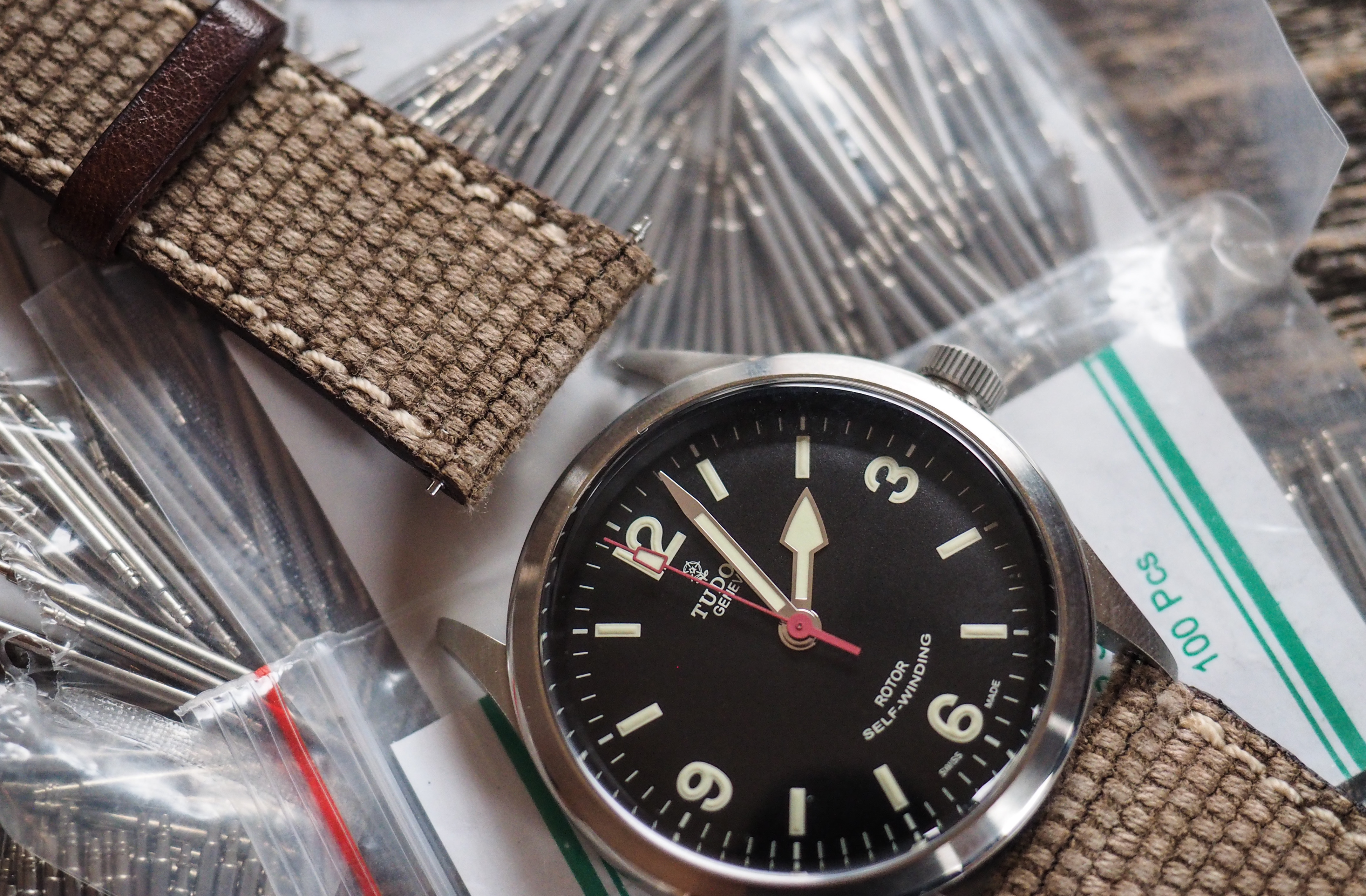 spring bar history inventor patent