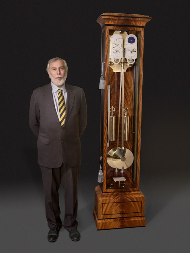 David Walter with his one of his double pendulum resonance clocks.
