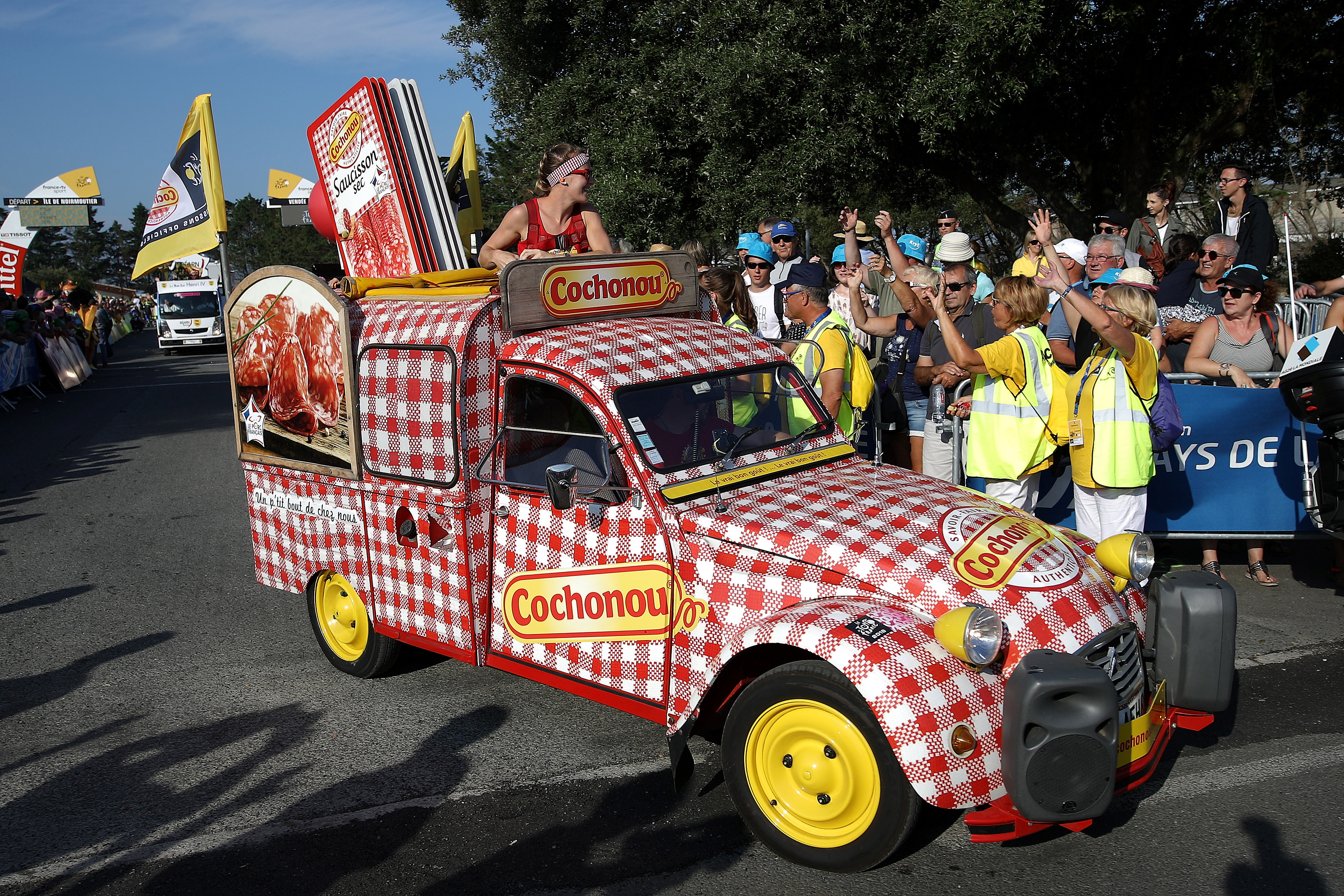 A checkered sausage truck