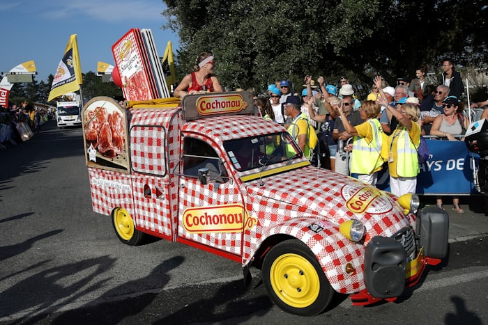 A checkered sausage truck