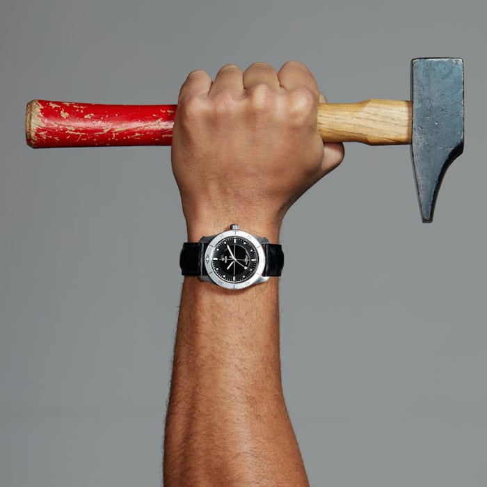 A hammer and a Hegid watch 