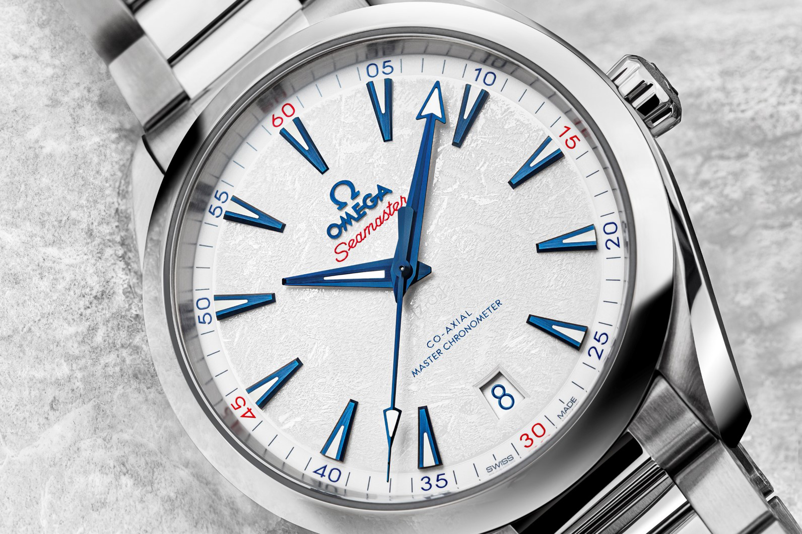 Close up photo of the Omega Seamaster Aqua Terra Beijing 2022 in the snow