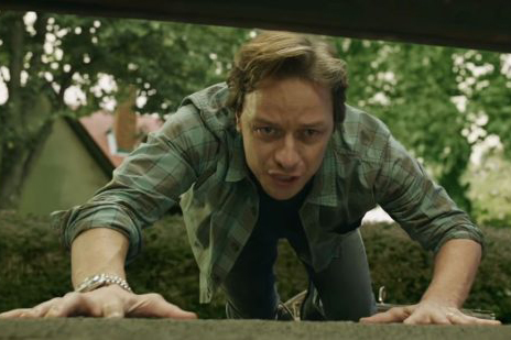 Dembrough (McAvoy) looking down the same sidewalk drain where Pennywide took his brother many years earlier. With his hand on the pavement, you can see his Rolex Datejust in It Chapter Two. 