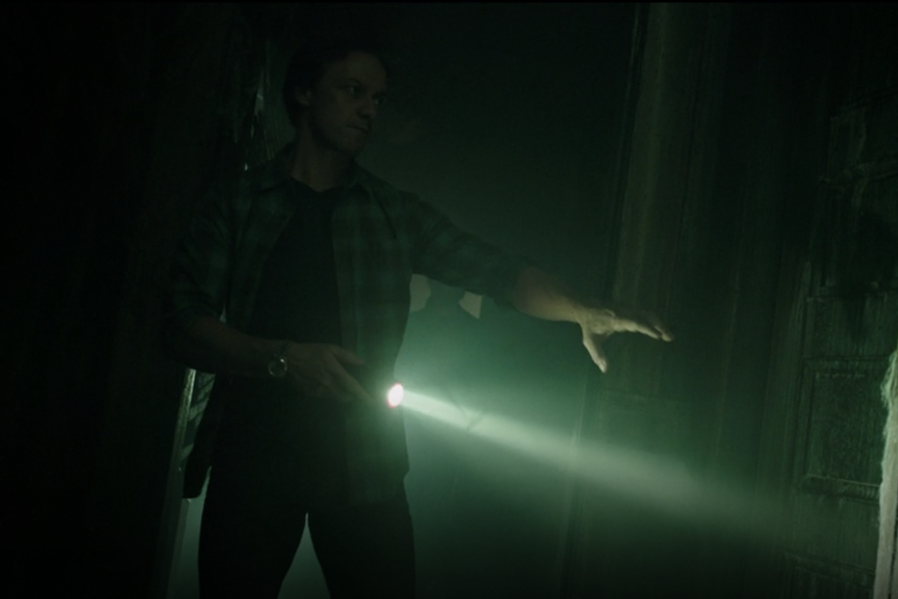 Dembrough (McAvoy) in what's essentially a house, with a flashlight, wearing his Datejust in It Chapter Two. 