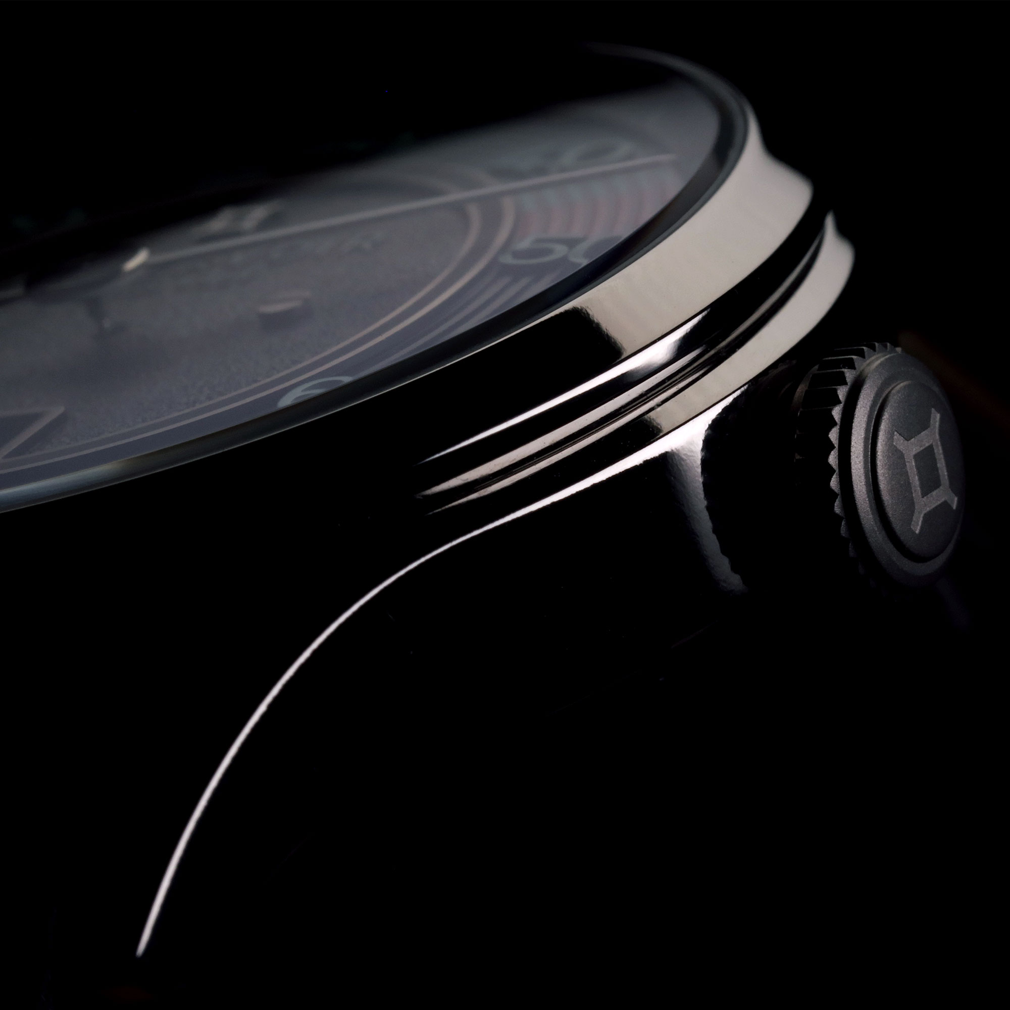 Crown of a watch on black background