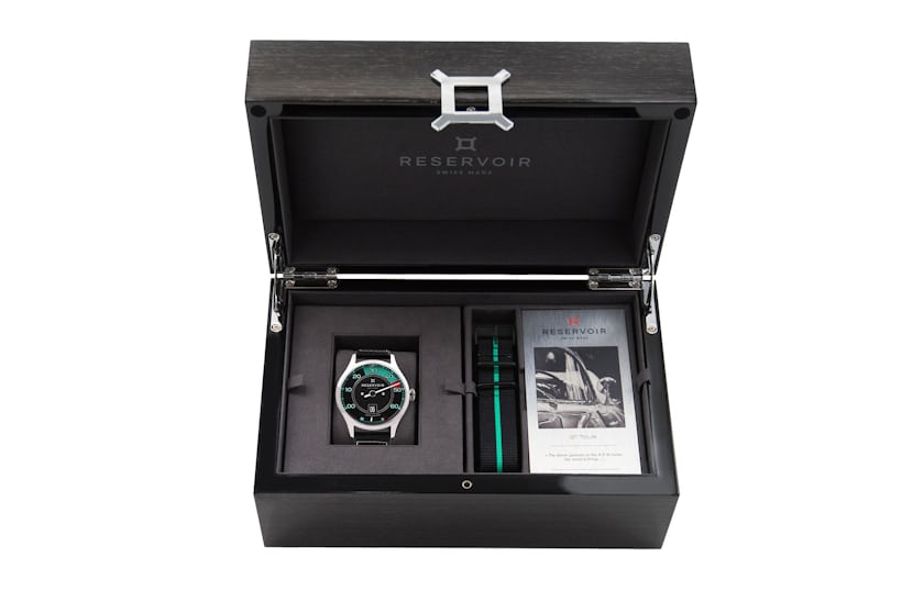 A watch in a black box with one strap