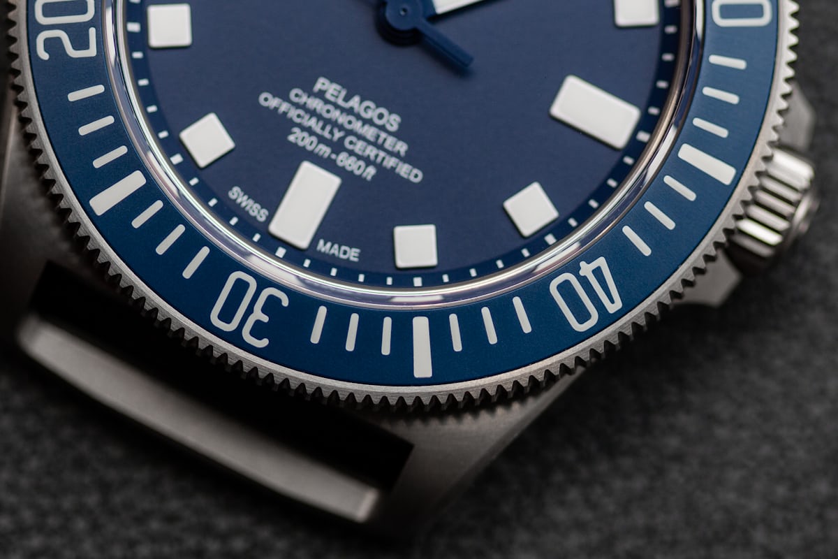 A close up shot of the bezel of the Pelagos FXD. 