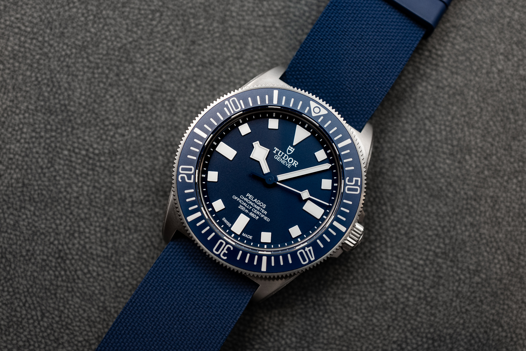 The Pelagos FXD on a blue rubber strap. 