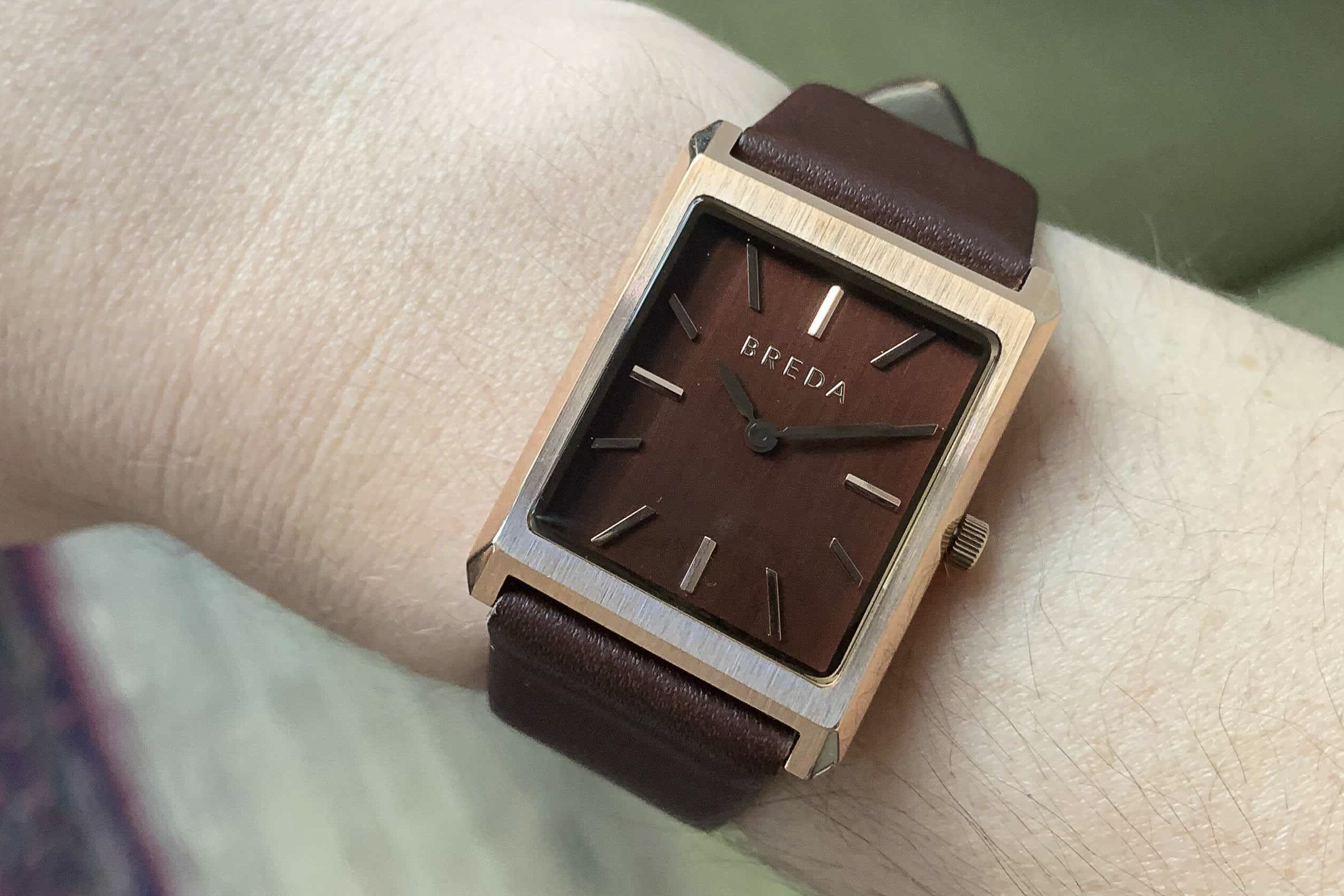 A Breda watch on a red strap