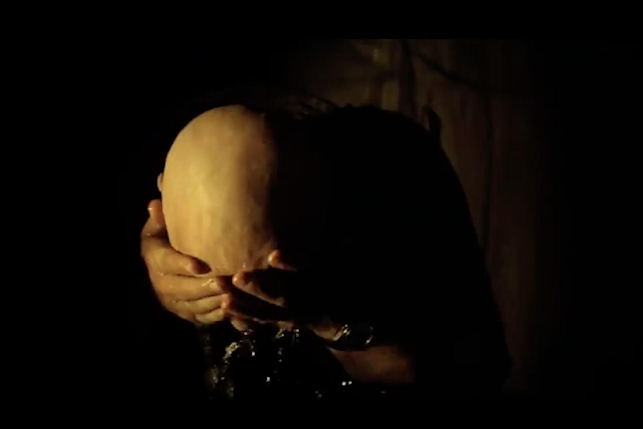 A man washing his face 