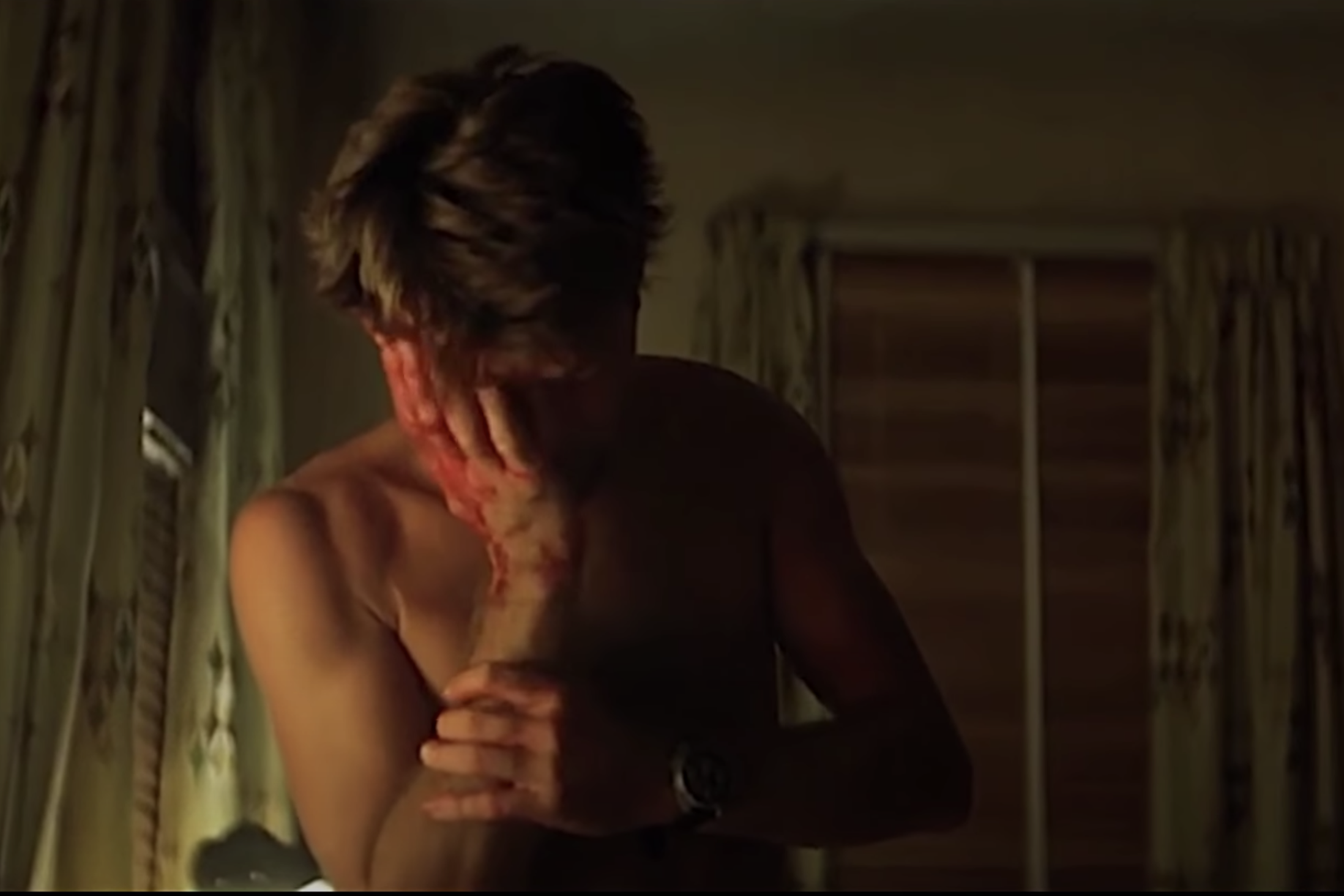 A man with his head in his hand