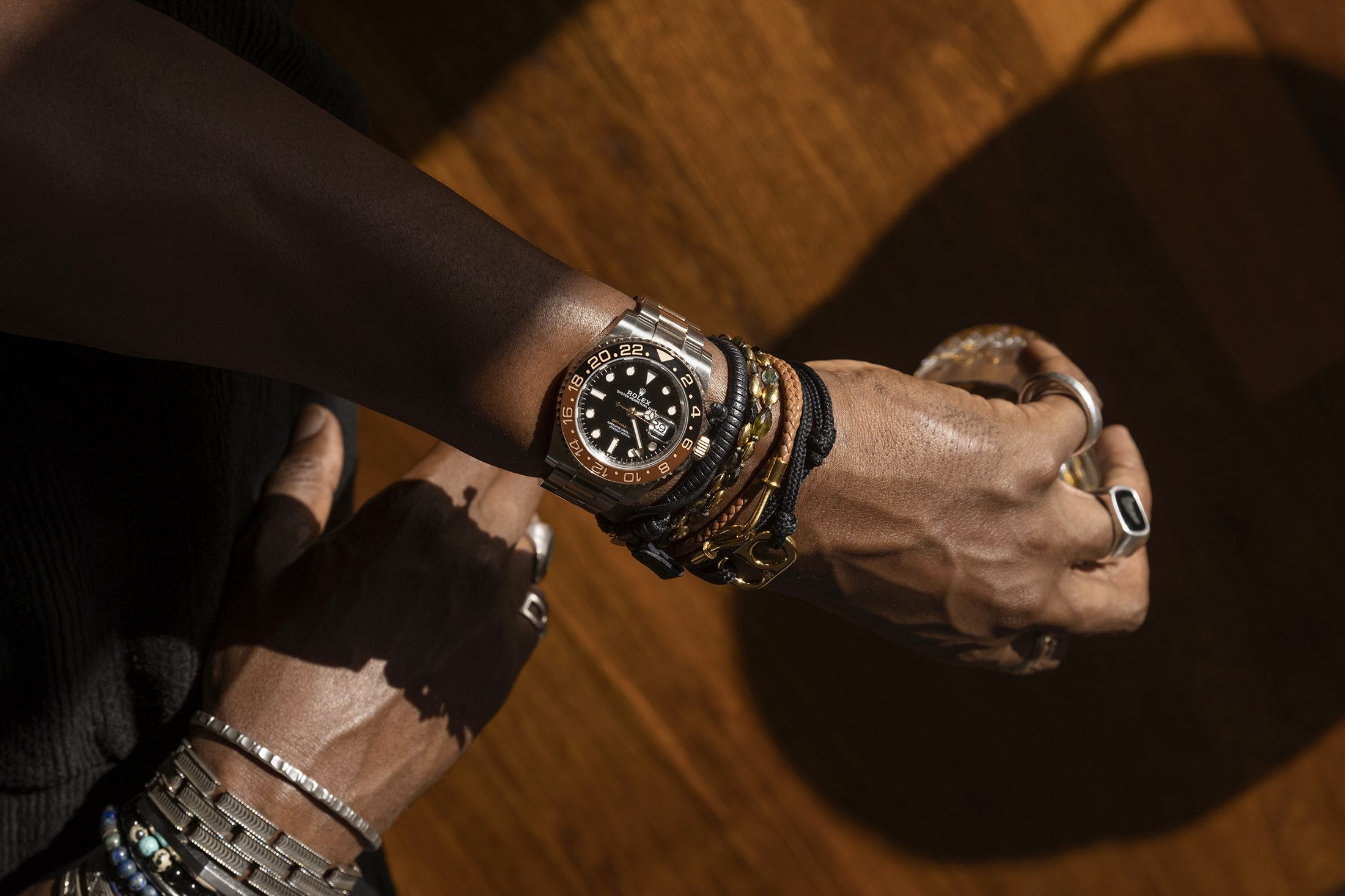 A Rolex GMT-Master II Ref. 126711CHNR on the wrist of a man