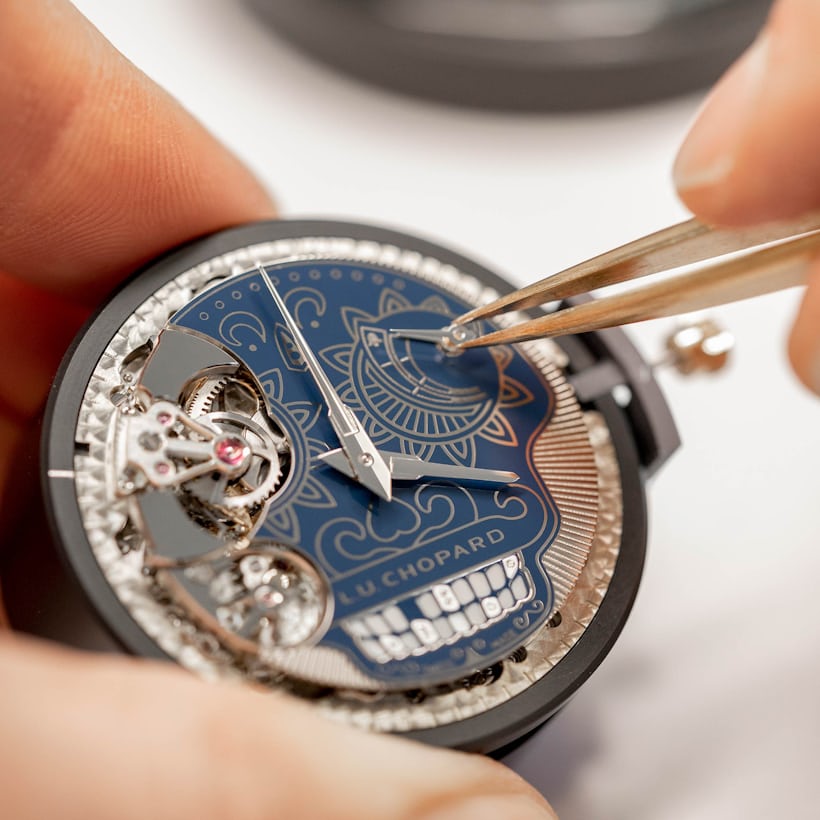 Placing the power reserve hand, which acts as one of the eyes of the calavera skull dial