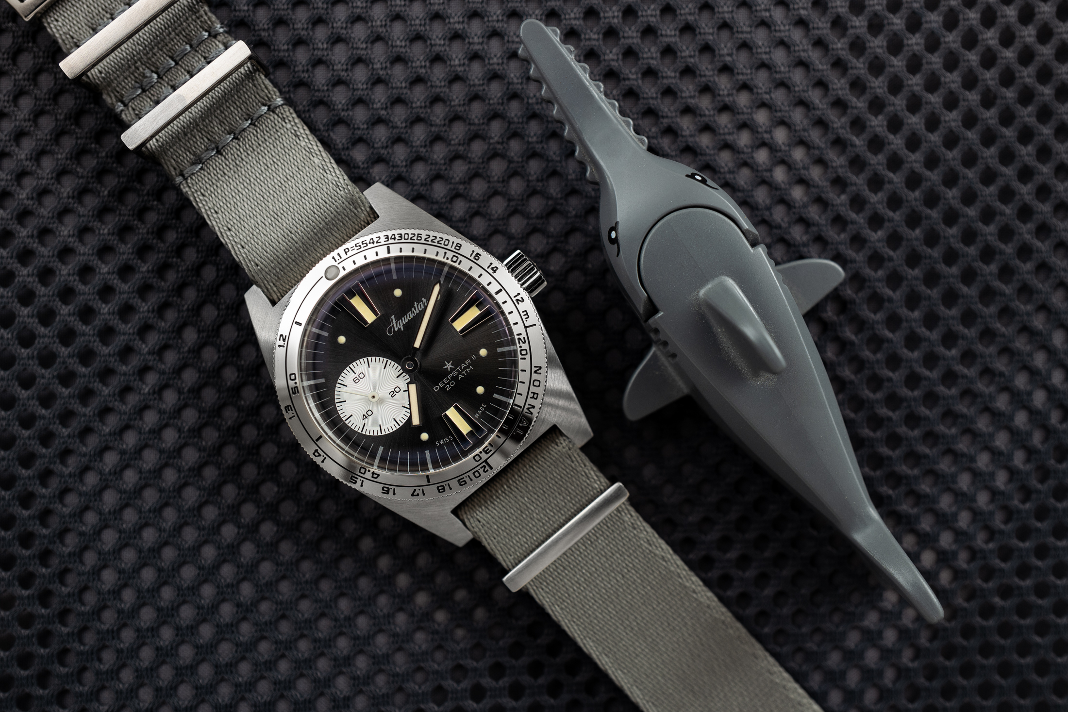 the aquastar deepstar ii sitting next to a plastic lego shark