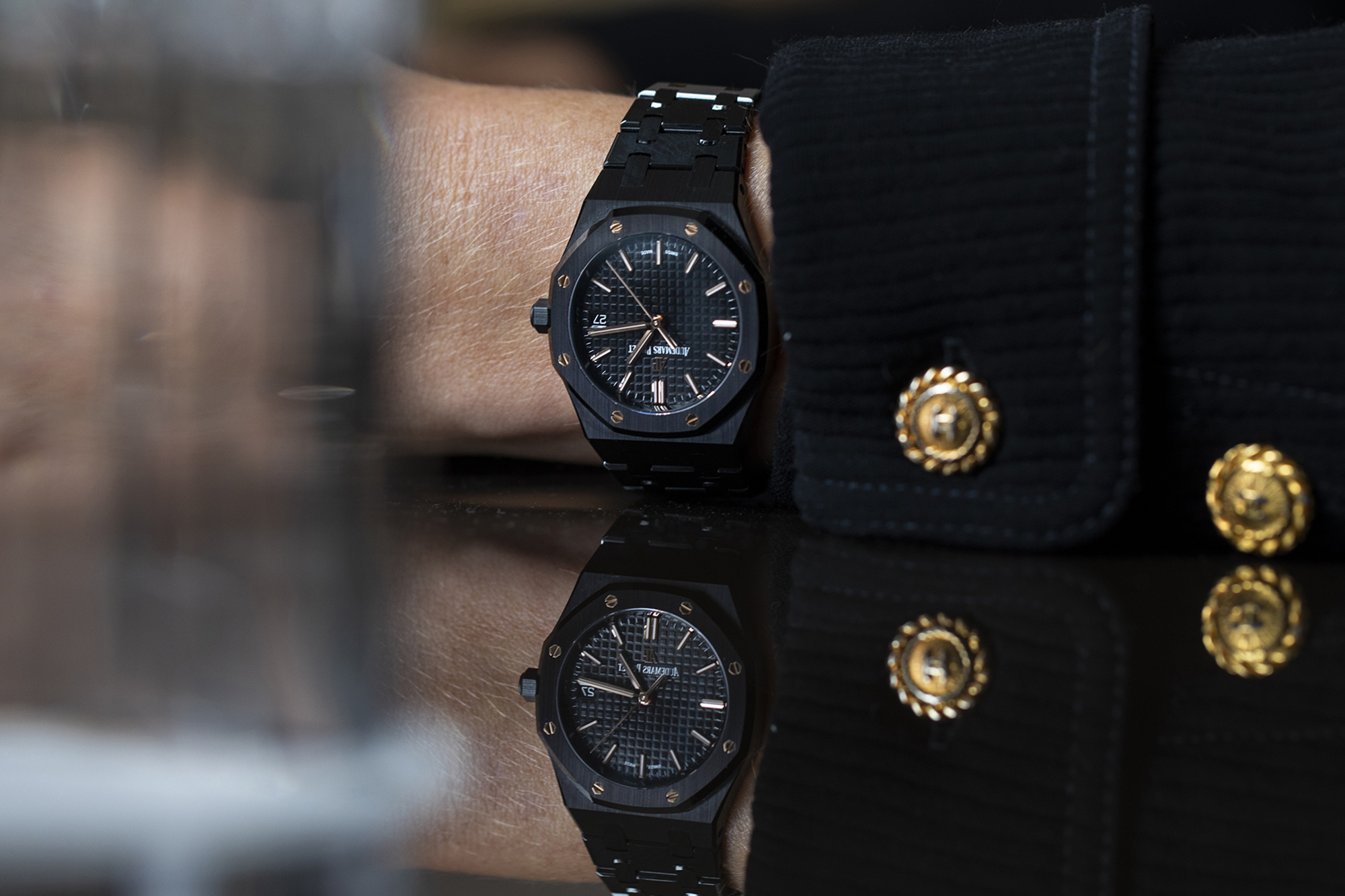 A black Royal Oak on a person's wrist