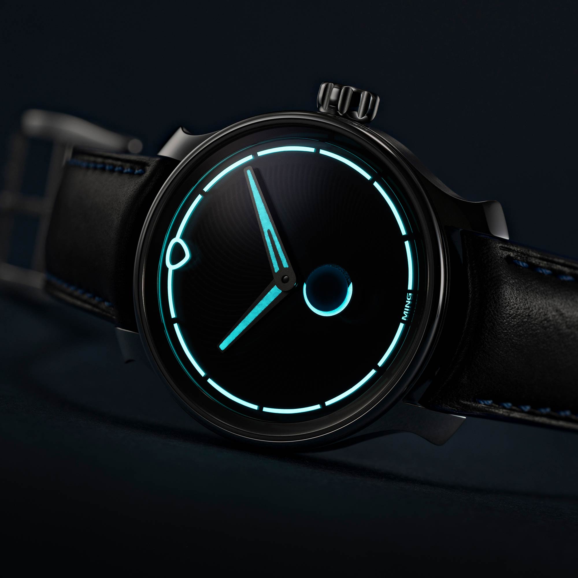 The Ming 37.05 Moonphase Date, showing the luminous material glowing