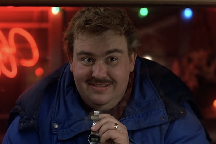 John Candy holding his Casio 