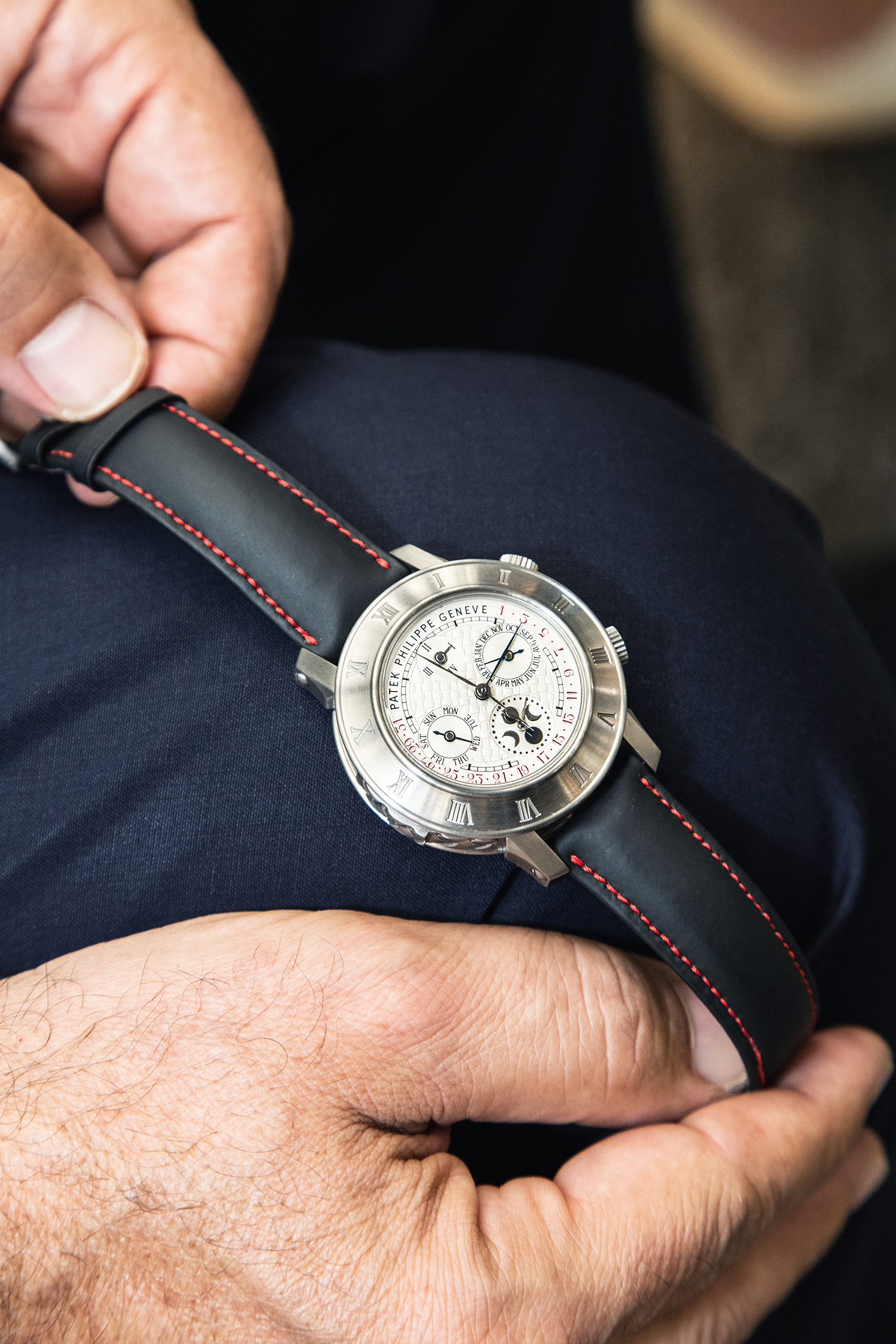 A person with a Patek Philippe watch