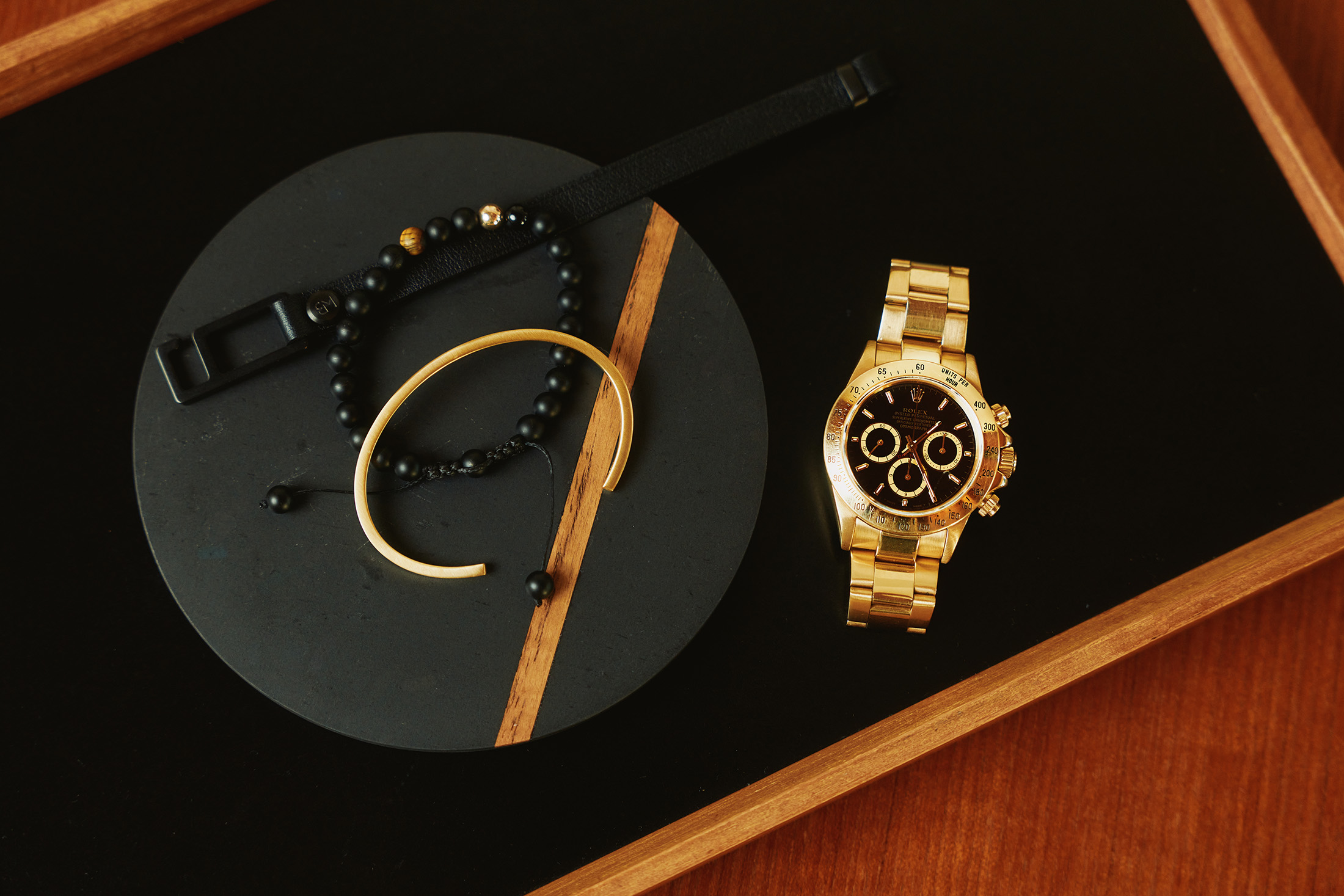 A gold  Rolex Daytona