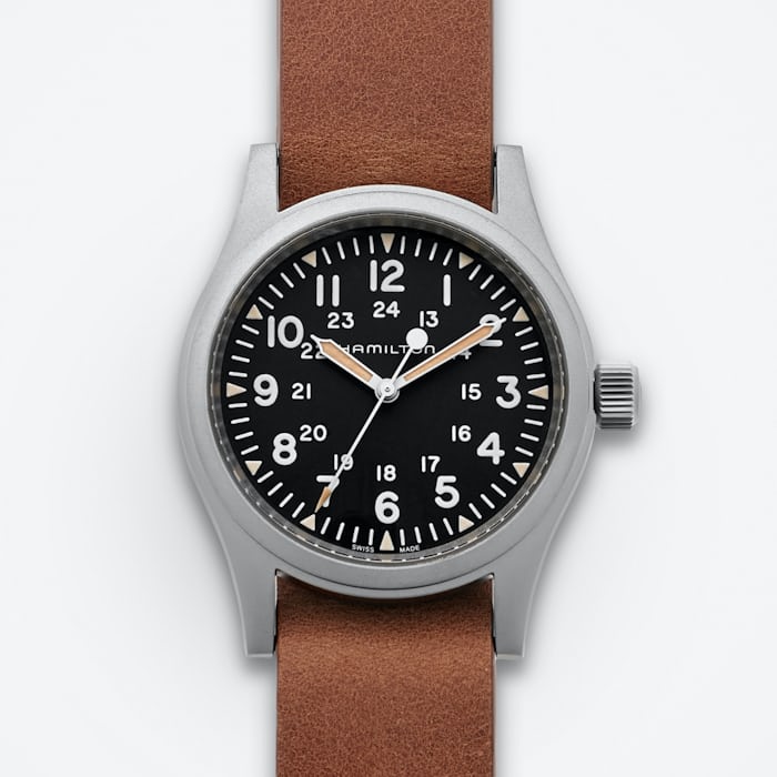 A Hamilton watch on a brown strap on a white background