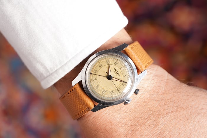 A Vulcain Cricket watch on a wrist 