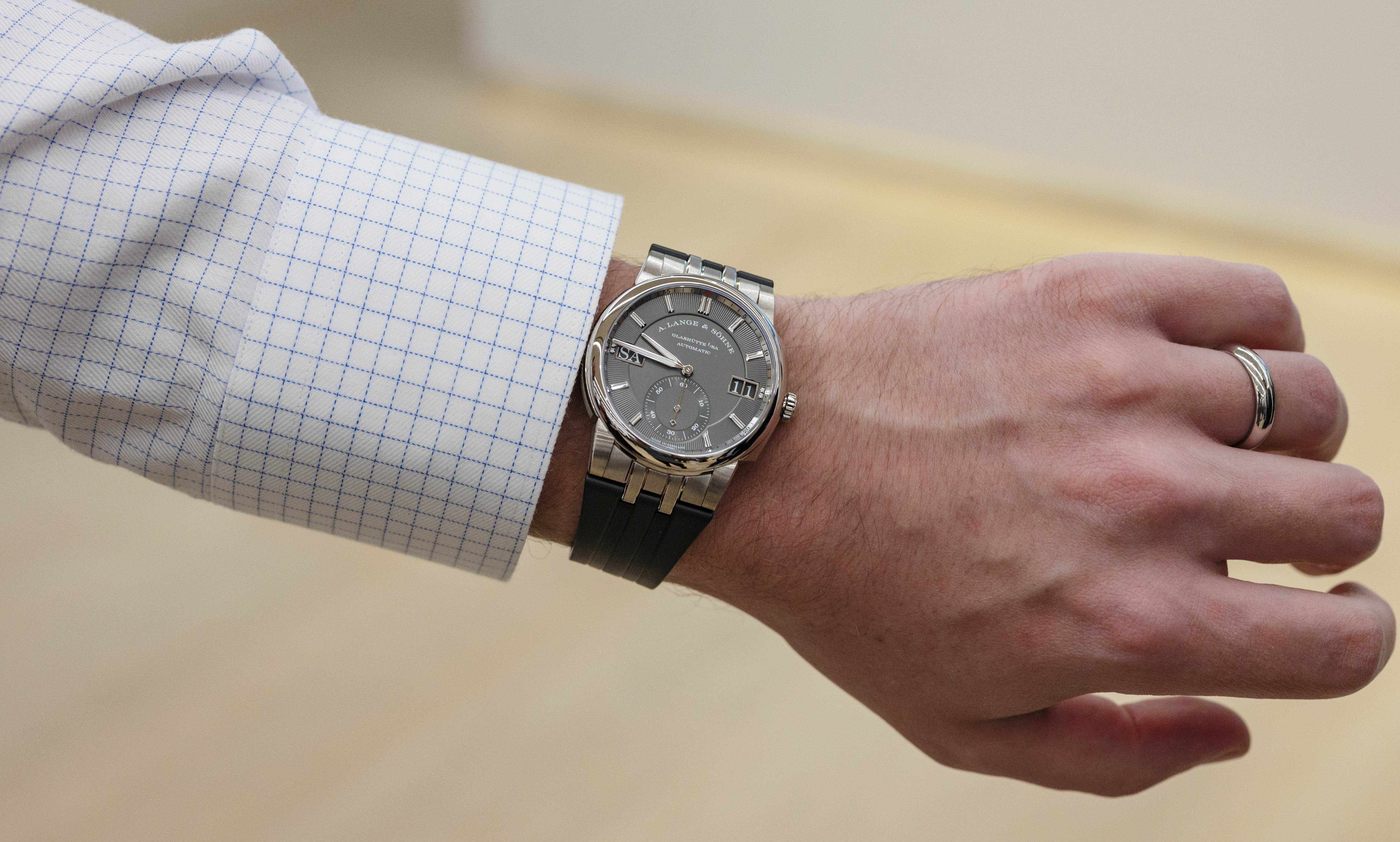 A man wears an A. Lange & Söhne Odysseus in white gold