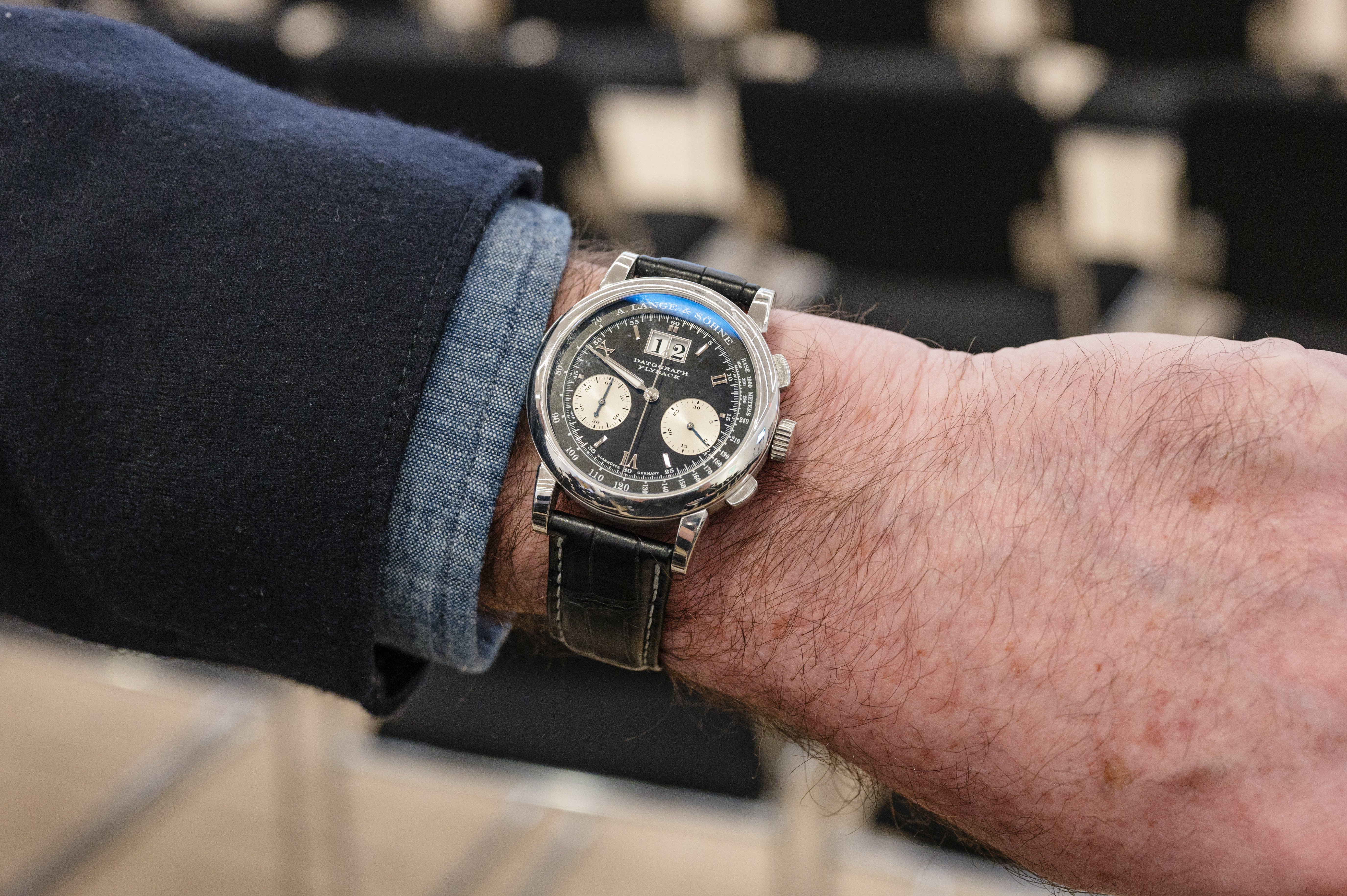 A man wears an A. Lange & Söhne Datograph