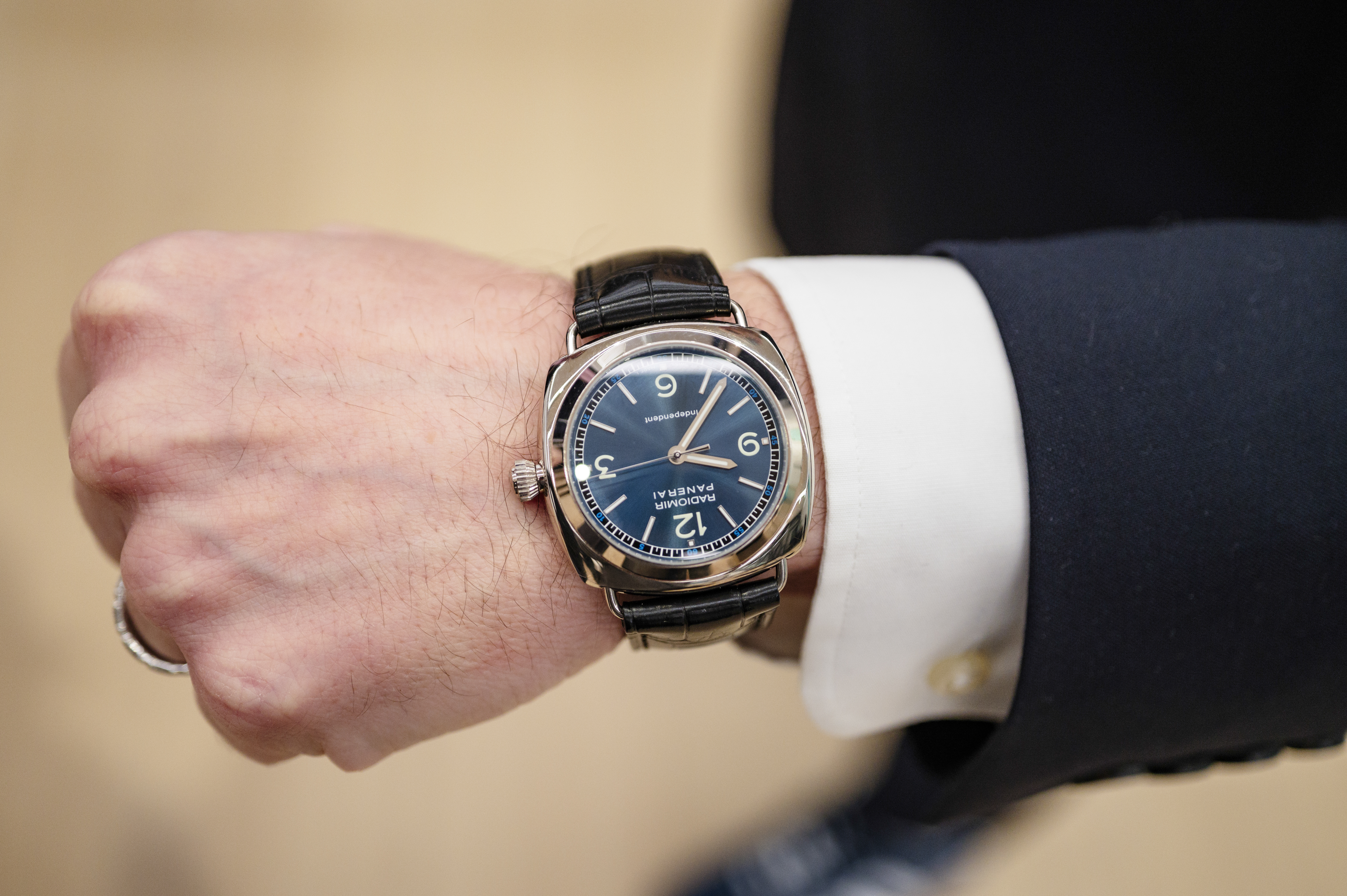 A man wears a Panerai Radiomir Independent 