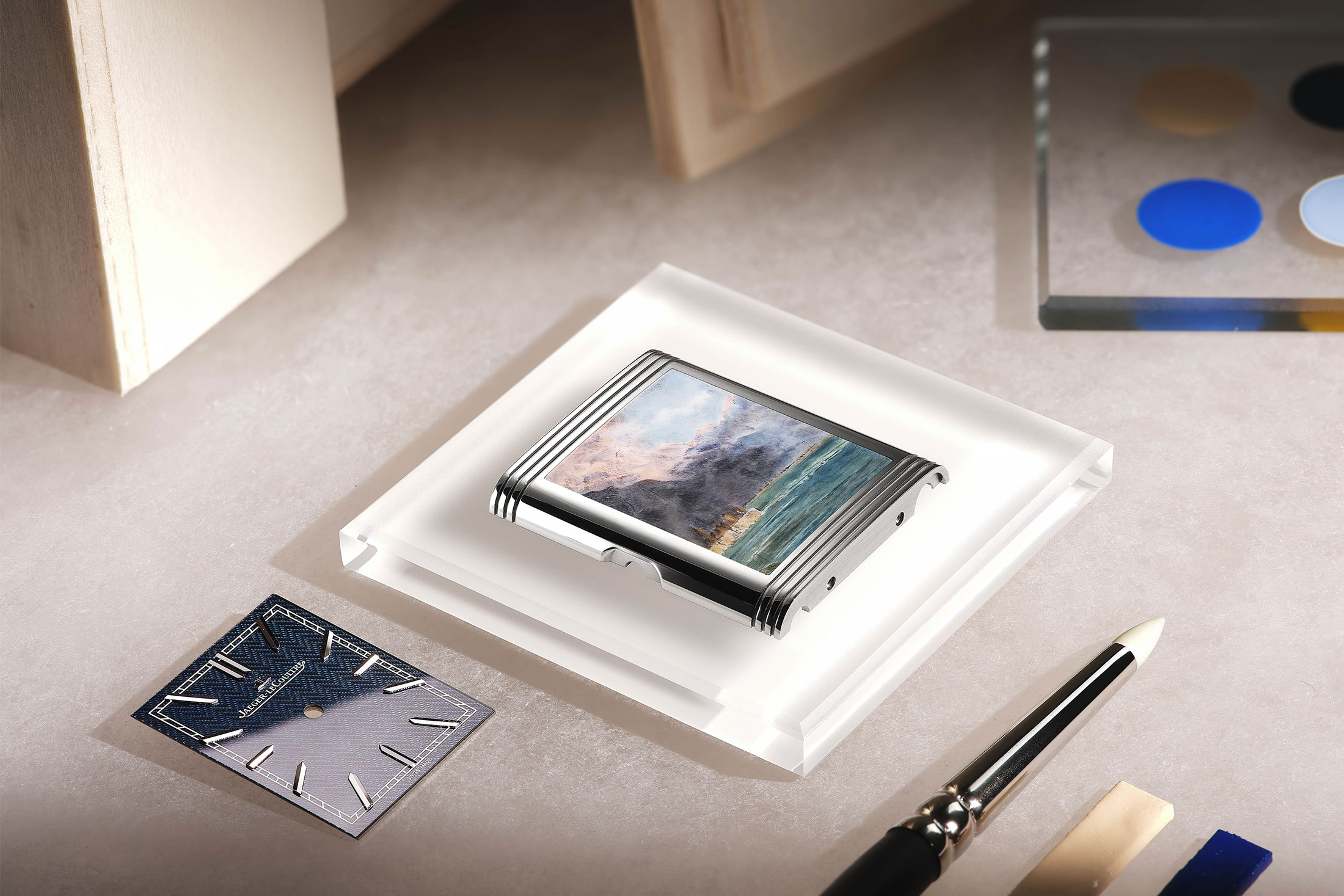 A Reverso dial and painted case with paintbrushes