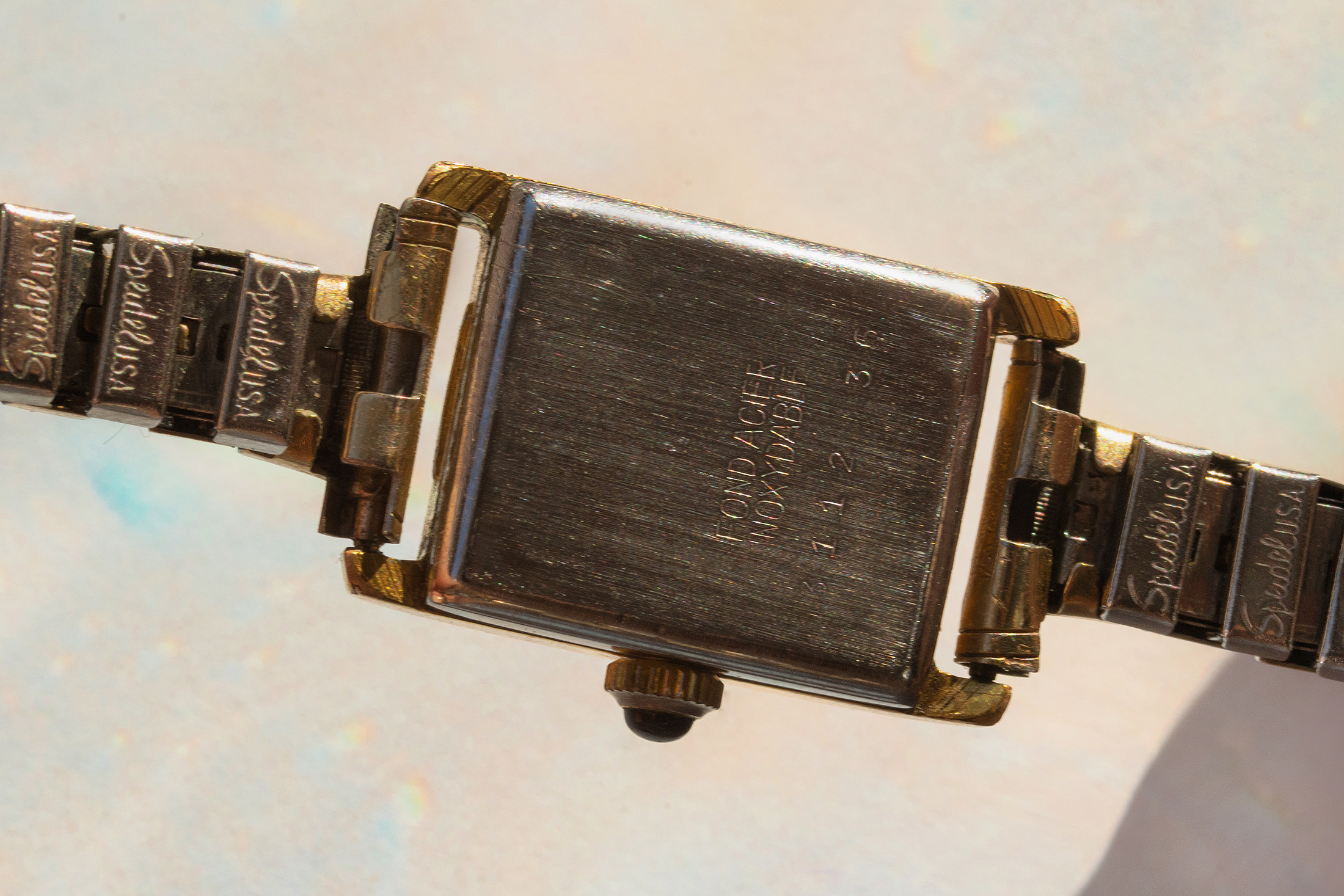 The caseback of an Eldor watch