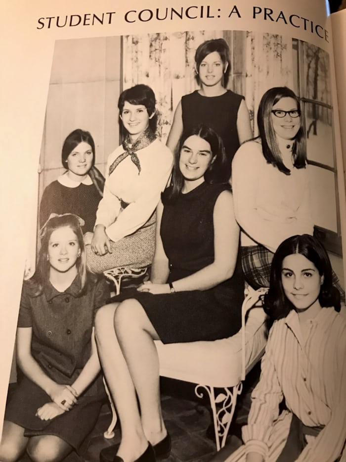 A black and white photo of a group of women