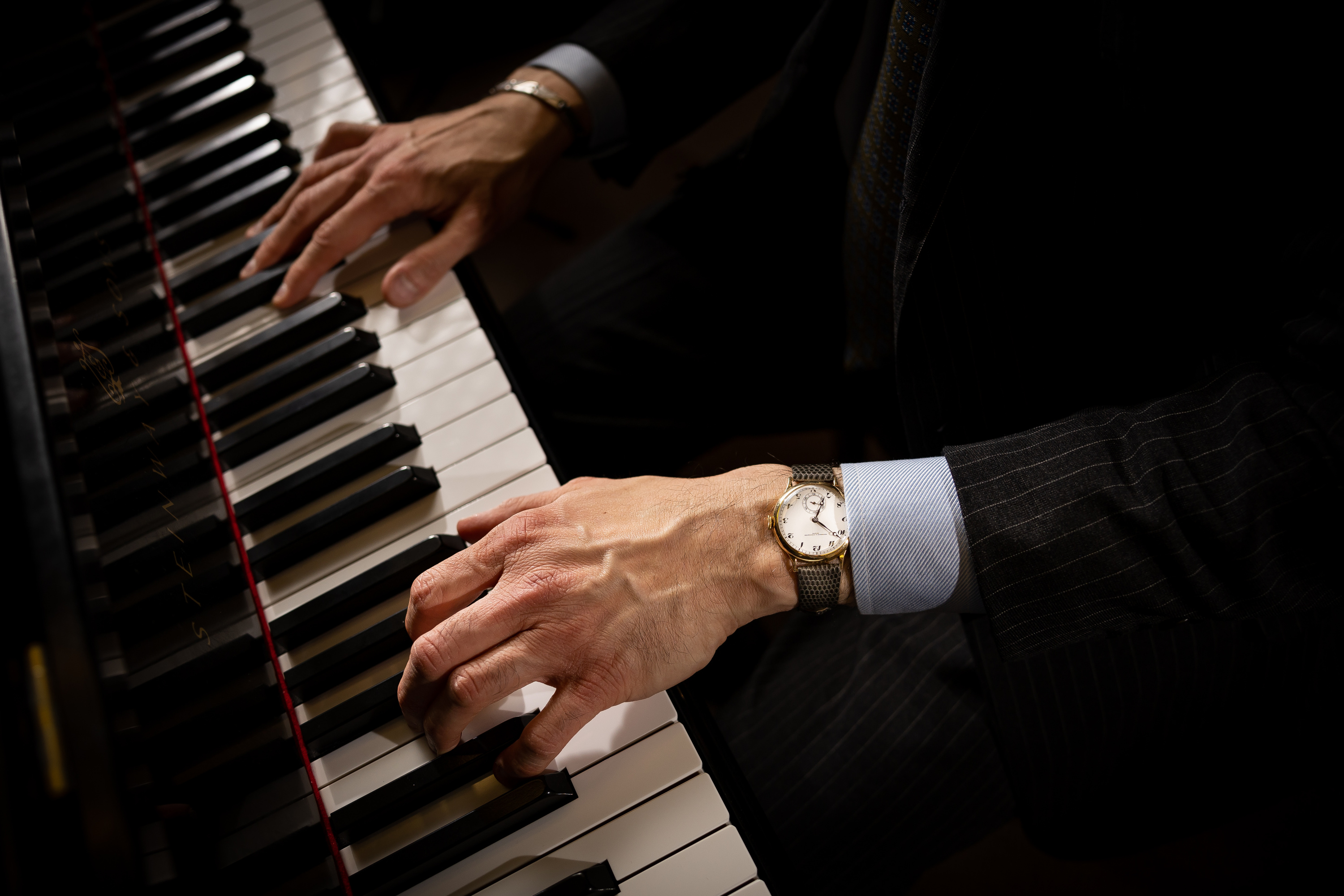 wearing VC while playing piano