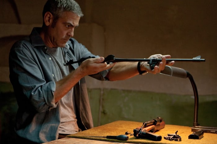 George Clooney building a gun, and wearing a Speedmaster in 'The American