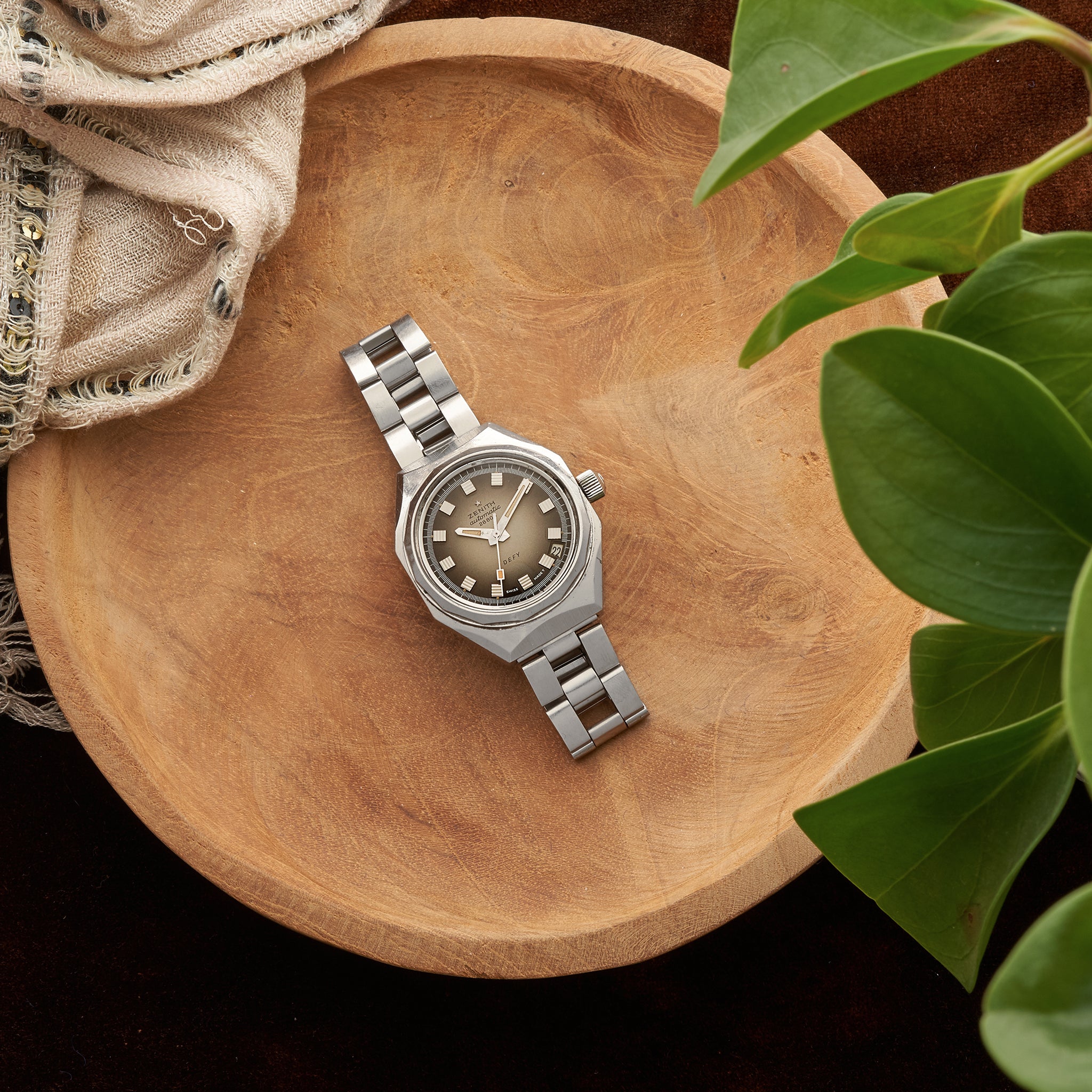 A lifestyle image of a vintage Zenith Defy wristwatch