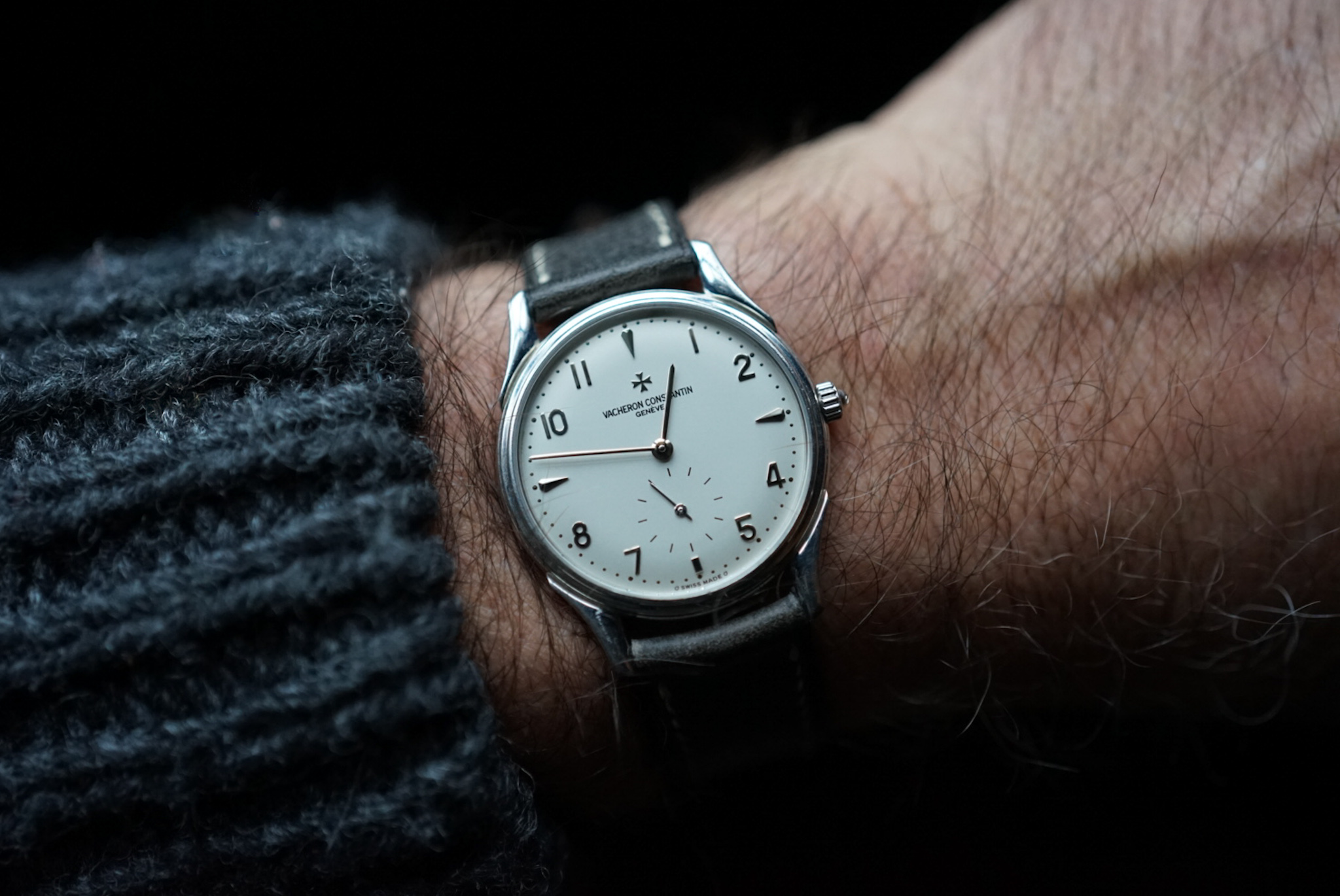 A man wears a Vacheron Constantin dress watch.