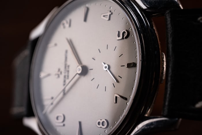 A close up of the dial of a Vacheron dress watch.