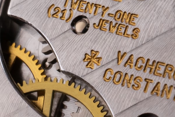A close up on a movement of a Vacheron dress watch