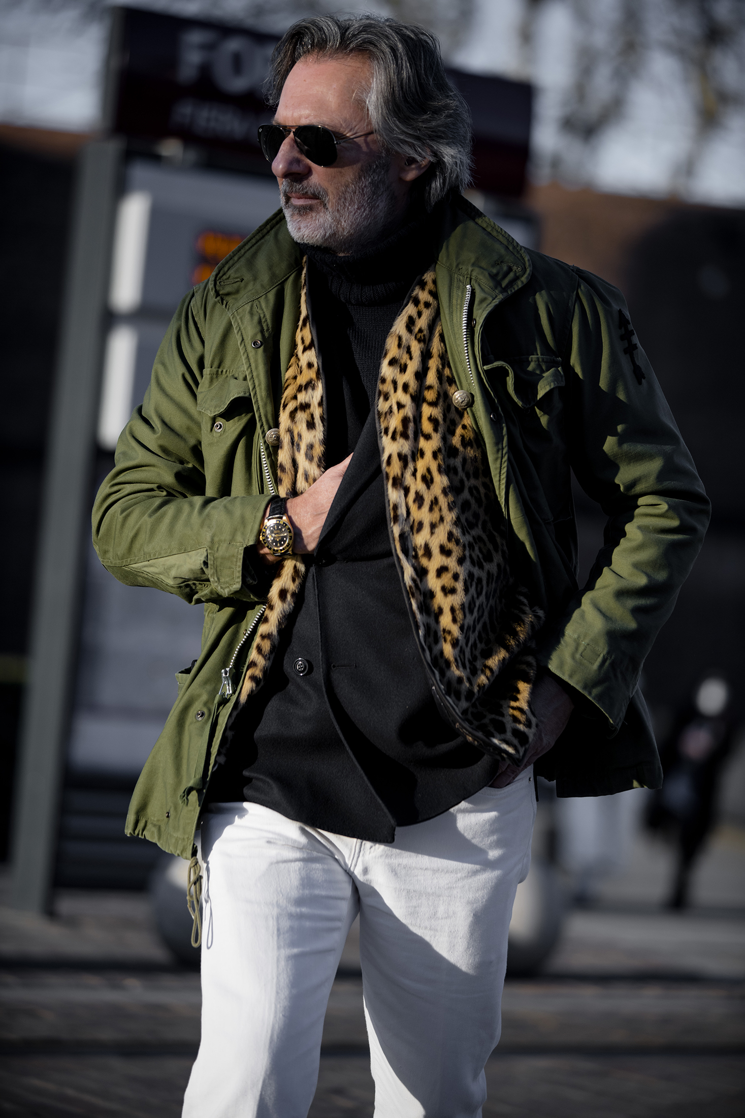 A man in sunglasses and a hat