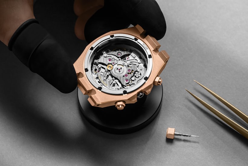 The royal oak chronograph being assembled. 