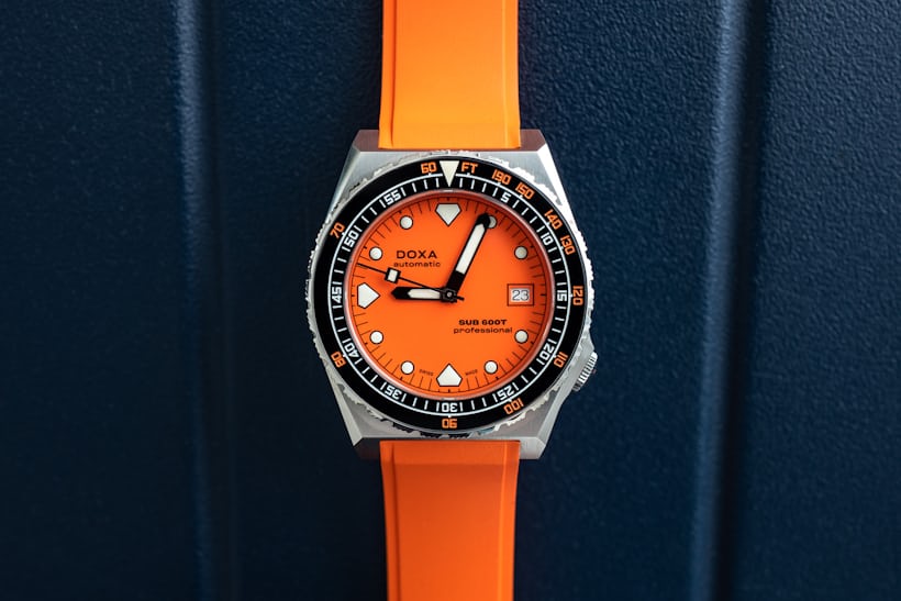 a portrait of the 600T professional on an orange rubber strap. 