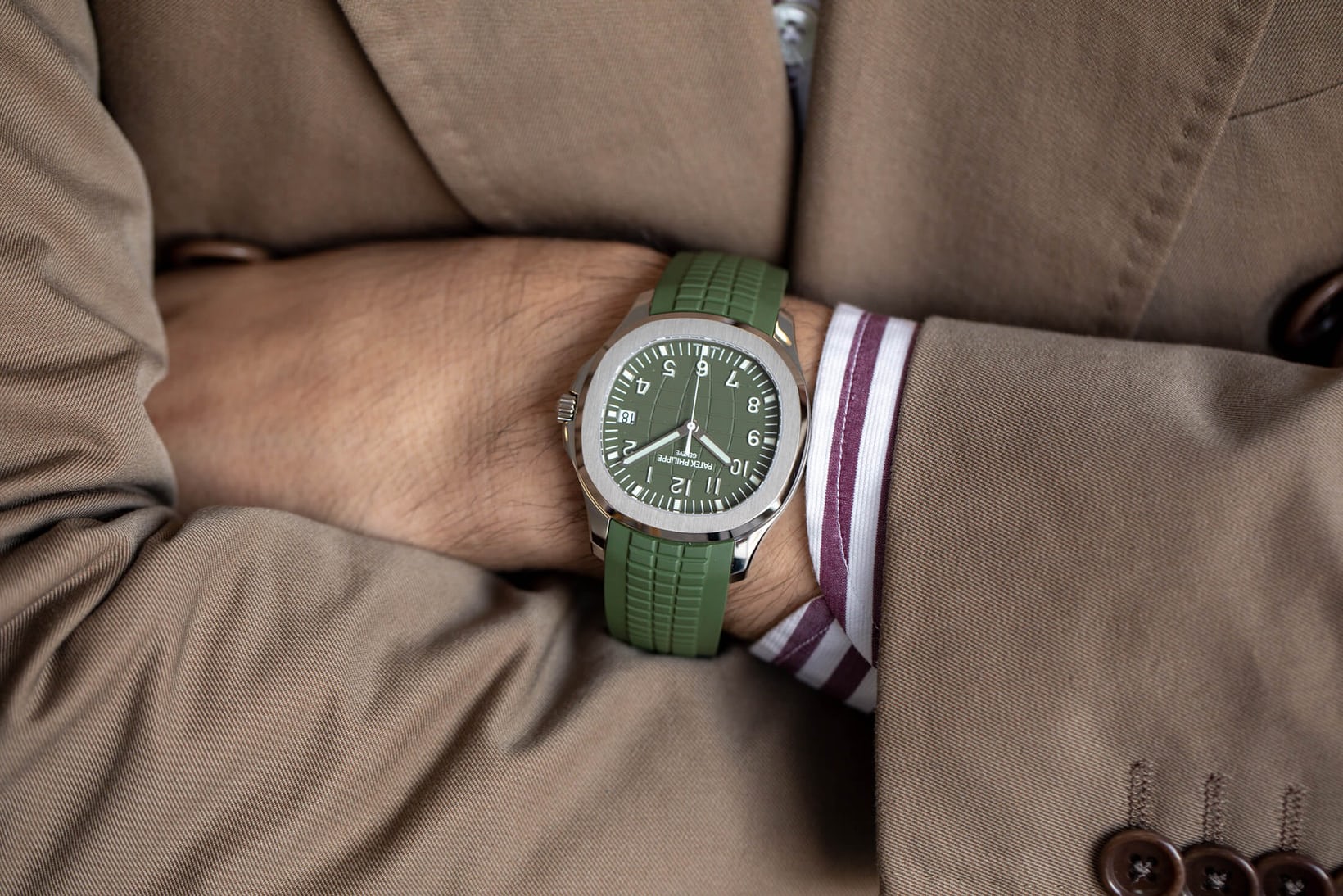 White gold Aquanaut, green dial, green strap, on wrist