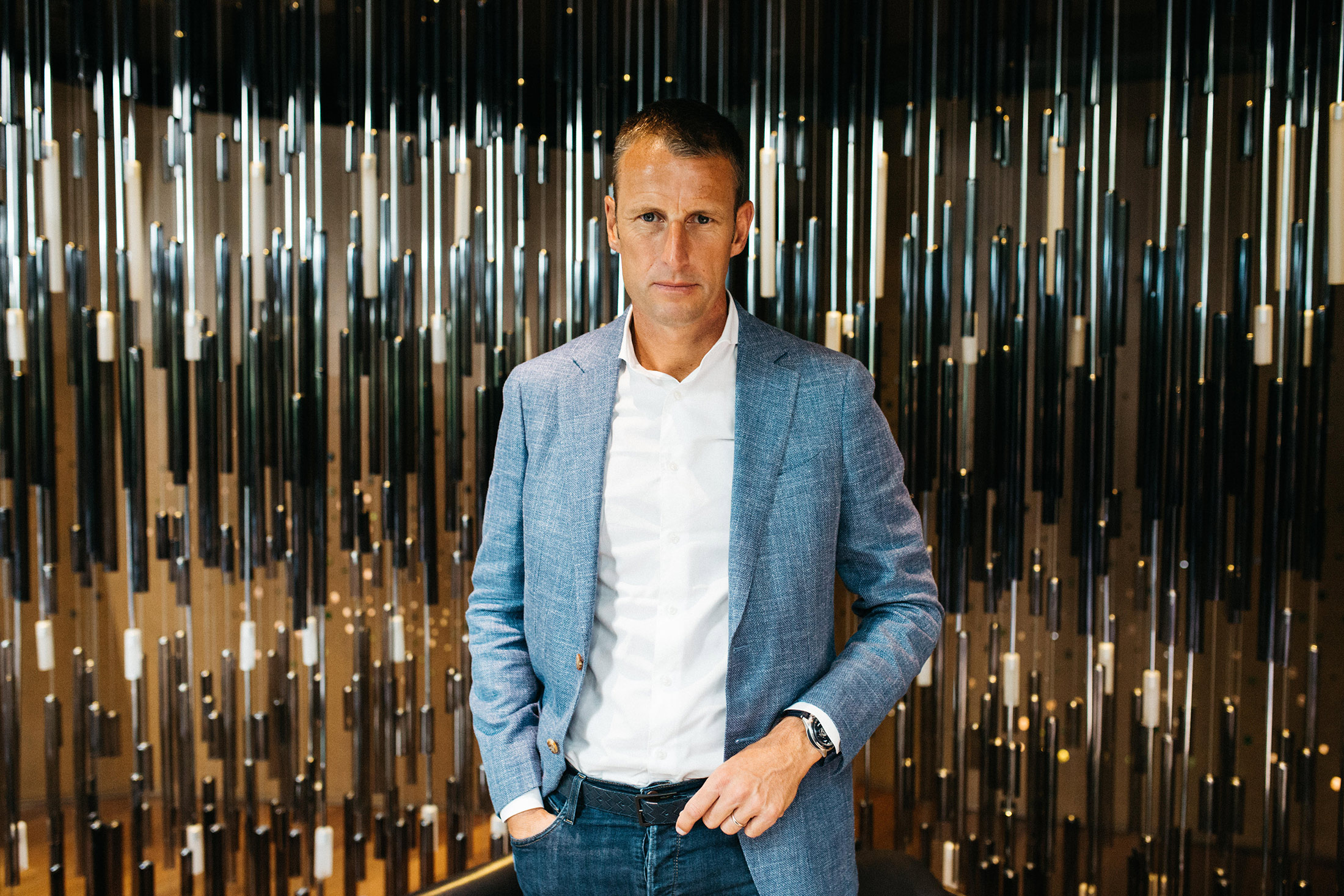 Patrick Pruniaux, standing