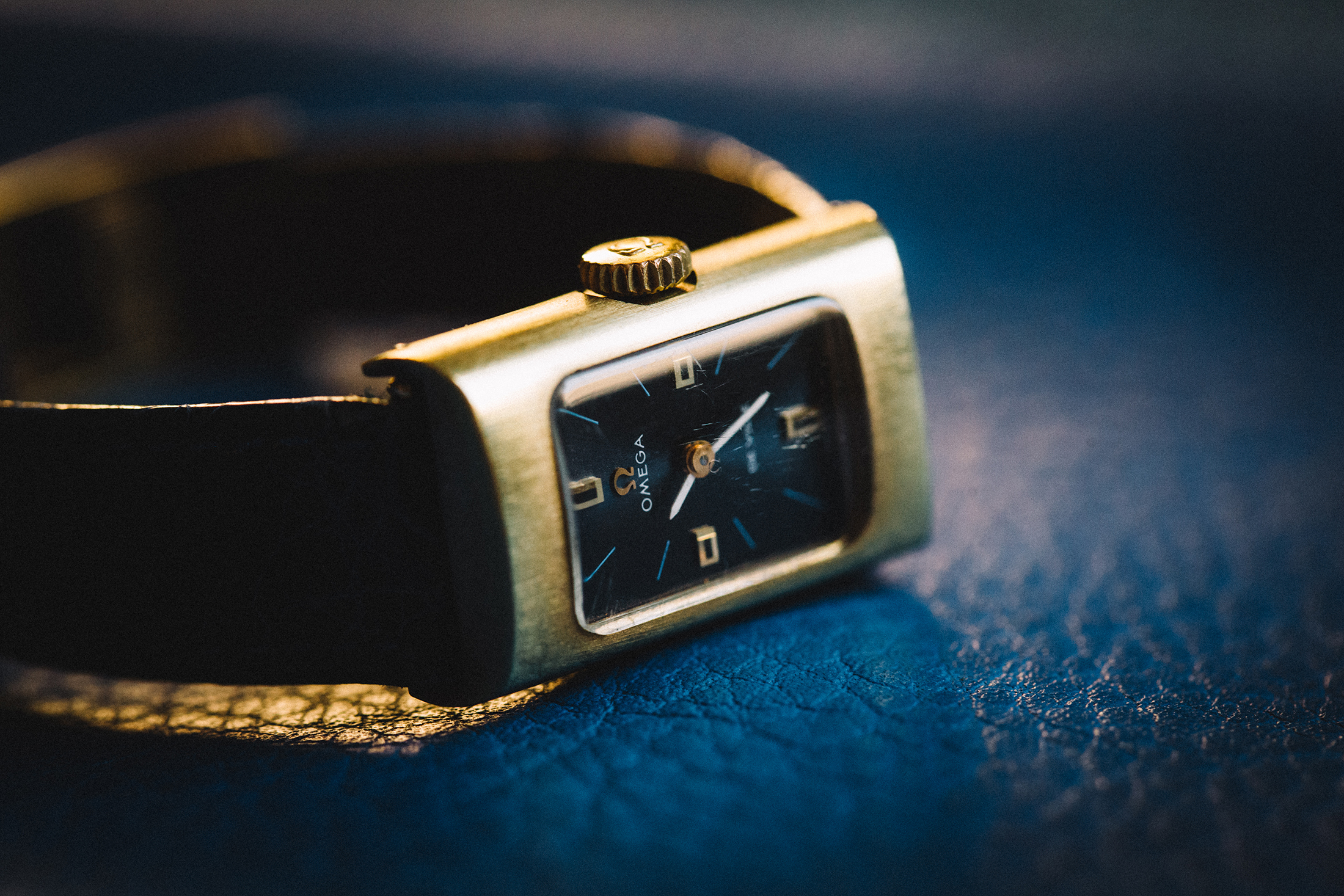 An Omega De Ville on its side