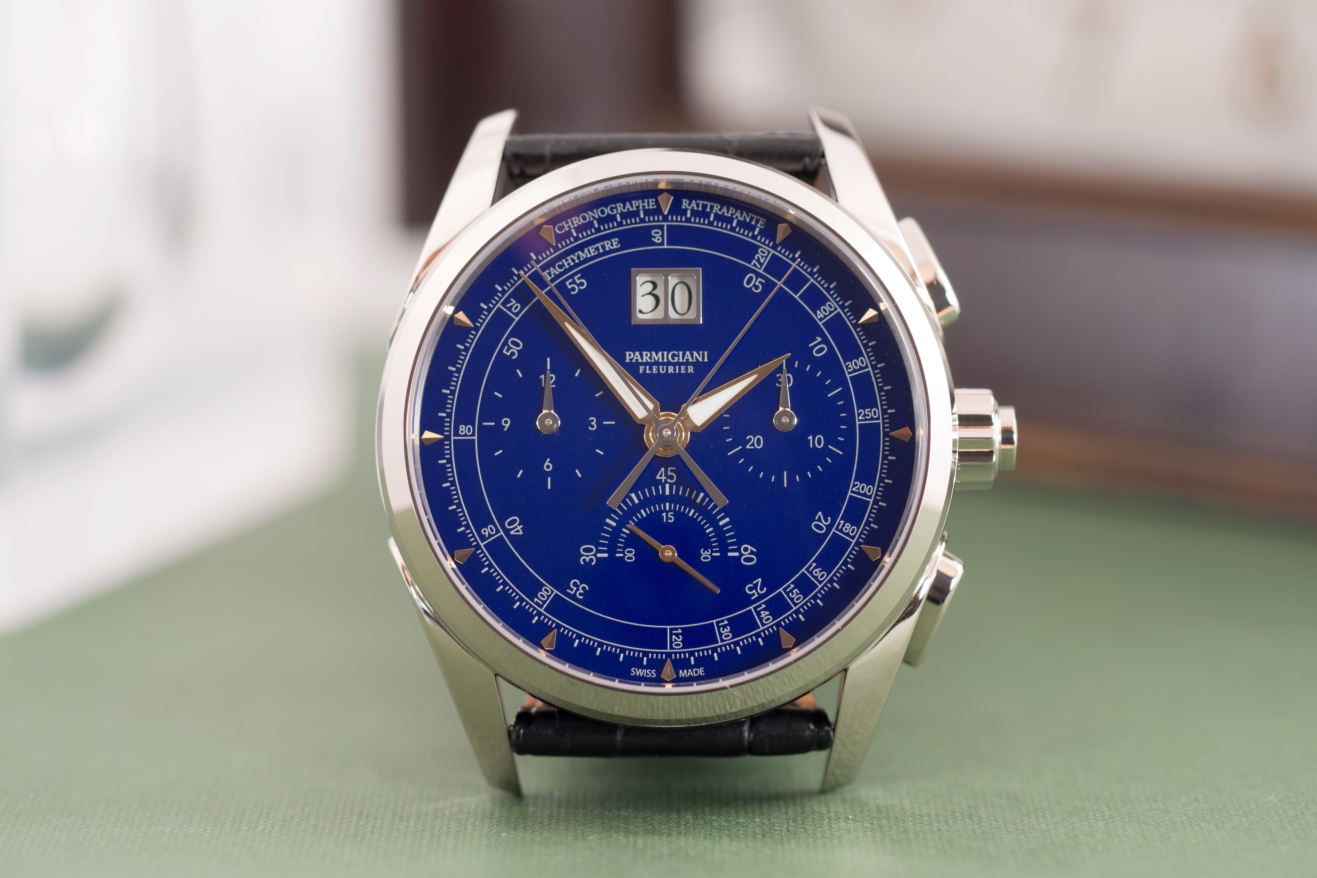 The Parmigiani Tonda Chronor Anniversaire sits upright