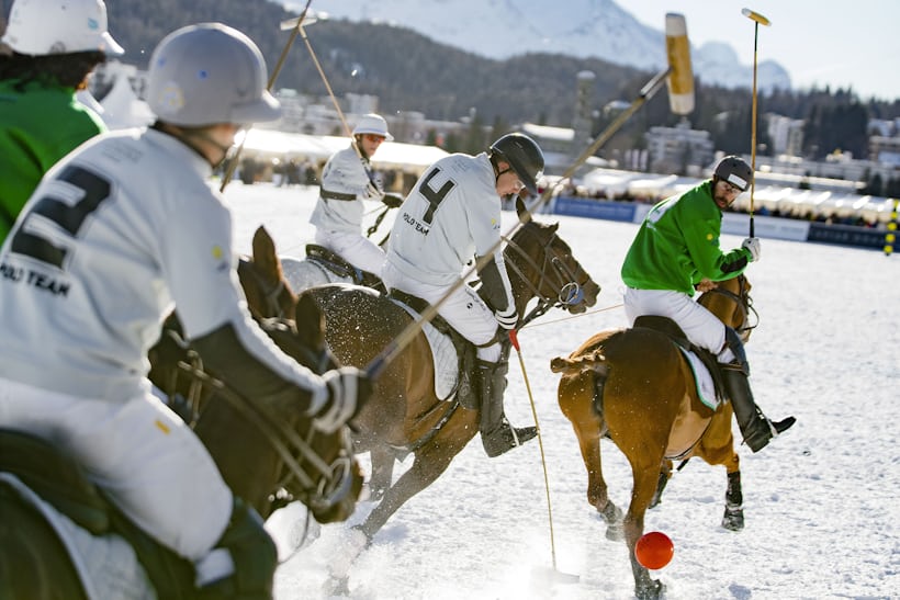 People playing snow polo 